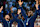 TOPSHOT - Gold medallists USA's #04 Stephen Curry (L), USA's #06 LeBron James and teammates celebrate on the podium after the men's Gold Medal basketball match between France and USA during the Paris 2024 Olympic Games at the Bercy Arena in Paris on August 10, 2024. (Photo by Aris MESSINIS / AFP) (Photo by ARIS MESSINIS/AFP via Getty Images)