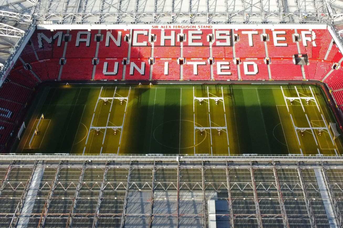 An aerial view shows Old Trafford stadium, home ground of to Manchester United football team, in Manchester, northern England, on November 23, 2022. - Manchester United's owners said Tuesday they were ready to sell the club after it was earlier confirmed star player Cristiano Ronaldo was leaving the Premier League giants. Weeks of turbulence at Old Trafford appeared to have come to an end when the club announced Ronaldo was leaving with "immediate effect". (Photo by Oli SCARFF / AFP) (Photo by OLI SCARFF/AFP via Getty Images)