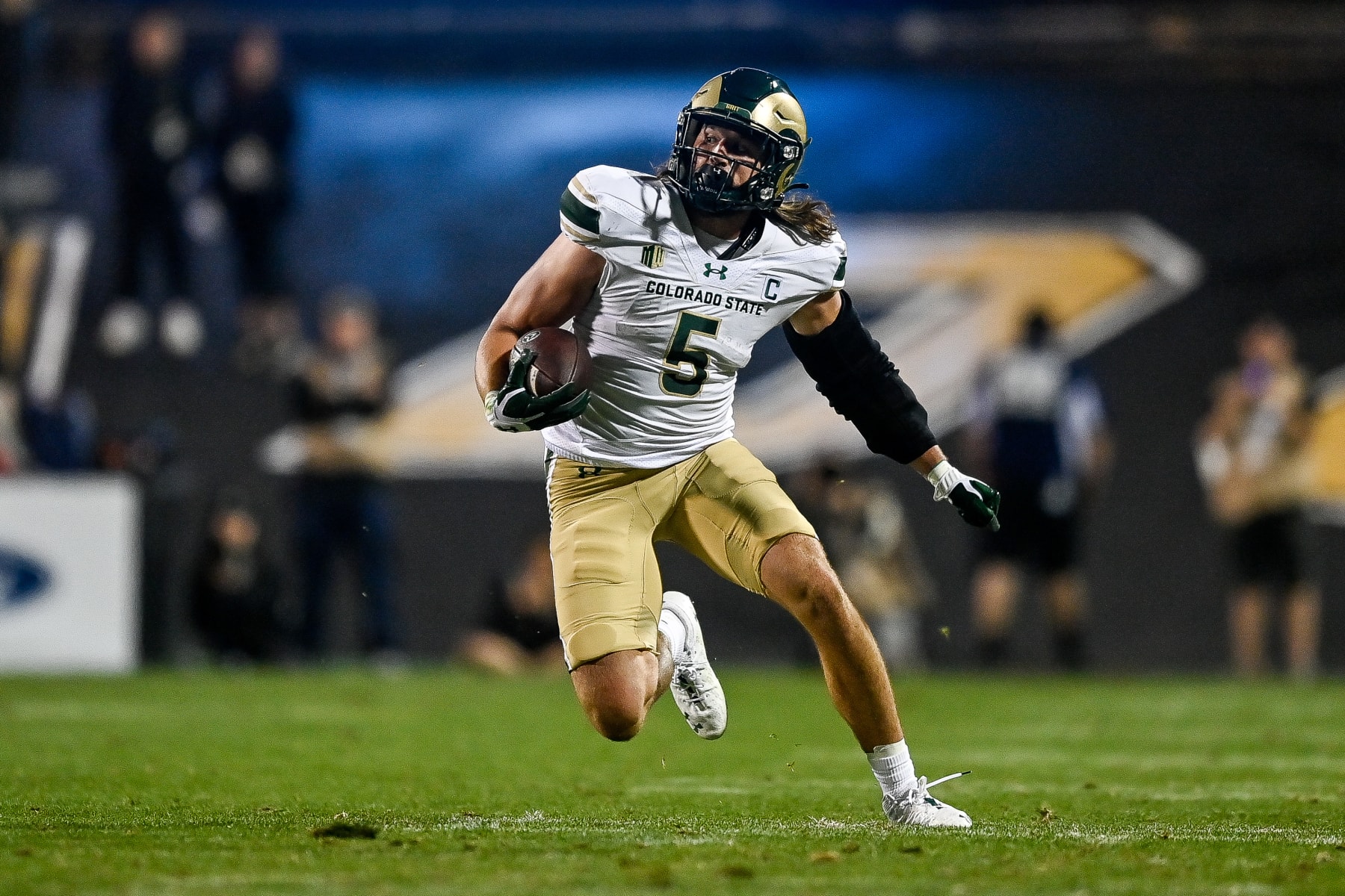 BOULDER, CO - SEPTEMBER 16: Tight end Dallin Holker #5 of the Colorado State Rams runs after a catch and gains 19 yards and a first down in the third quarter against the Colorado Buffaloes at Folsom Field on September 16, 2023 in Boulder, Colorado. (Photo by Dustin Bradford/Getty Images)