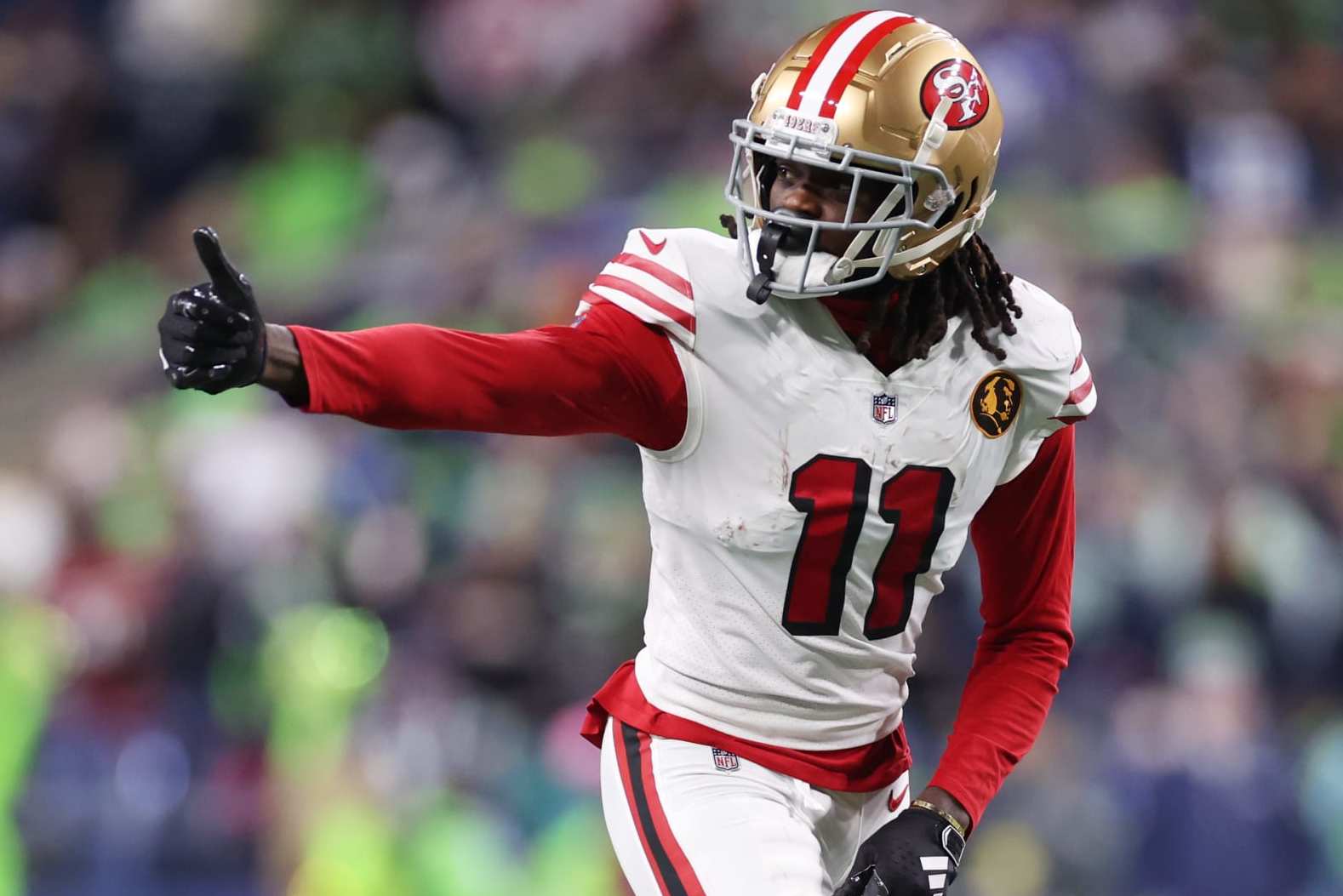 SEATTLE, WASHINGTON - NOVEMBER 23: Brandon Aiyuk #11 of the San Francisco 49ers looks on during the first half against the Seattle Seahawks at Lumen Field on November 23, 2023 in Seattle, Washington. (Photo by Steph Chambers/Getty Images)