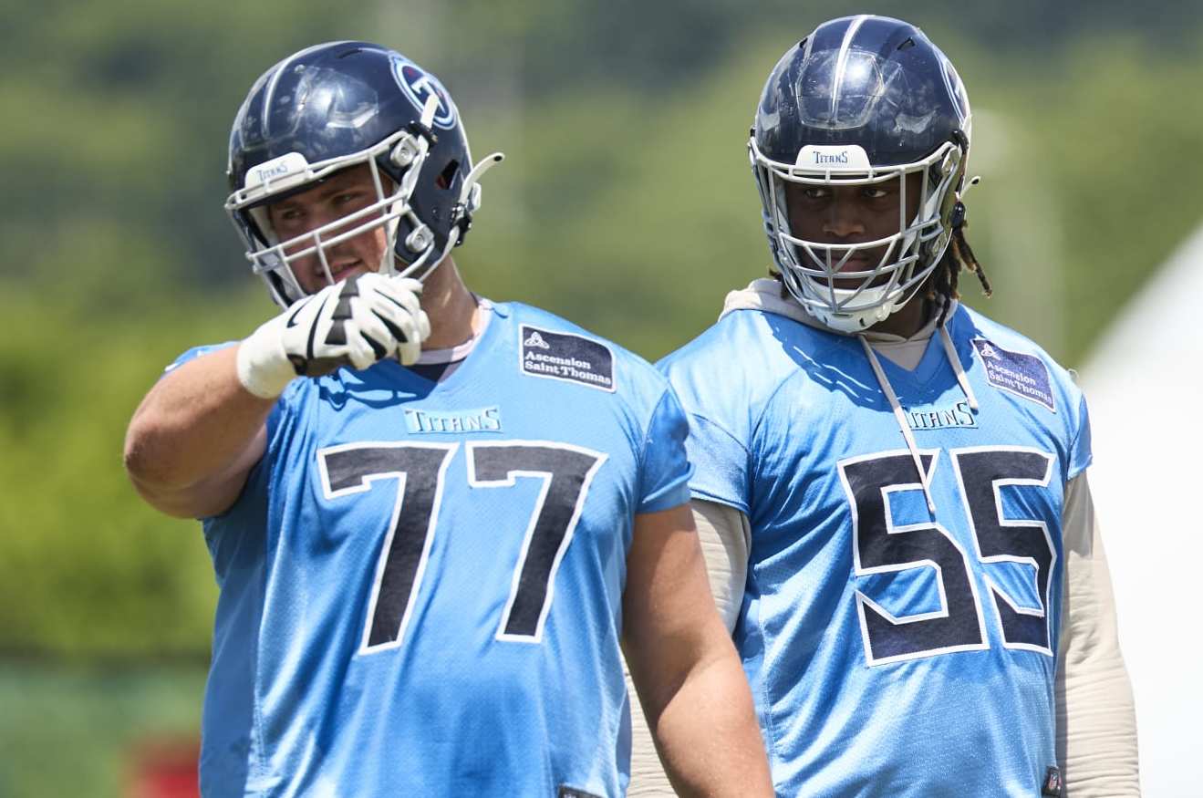 Tennessee Titans left guard Peter Skoronski (left) and left tackle JC Latham (right)