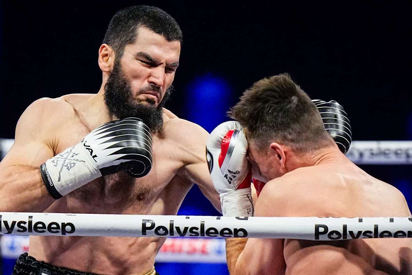 QUEBEC CITY, CANADA - JANUARY 13: Artur Beterbiev of Canada punches Callum Smith of the United Kingdom during their WBC, IBF and WBO light-heavyweight world championship fight at Videotron Centre on January 13, 2024 in Quebec City, Canada. (Photo by Mathieu Belanger/Getty Images)