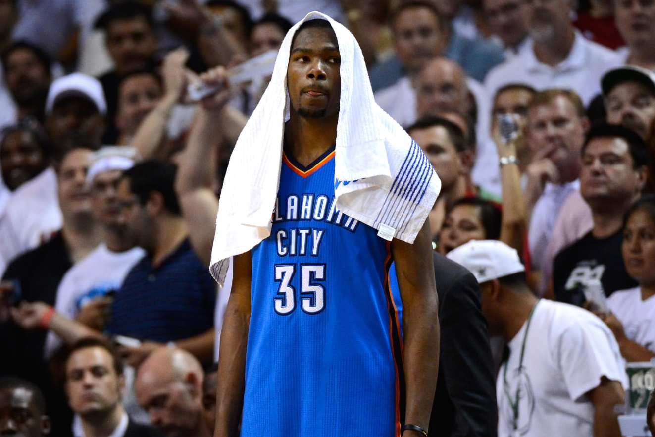 MIAMI, FL - JUNE 21:  Kevin Durant #35 of the Oklahoma City Thunder looks on dejected late in the fourth quarter against the Miami Heat in Game Five of the 2012 NBA Finals on June 21, 2012 at American Airlines Arena in Miami, Florida. NOTE TO USER: User expressly acknowledges and agrees that, by downloading and or using this photograph, User is consenting to the terms and conditions of the Getty Images License Agreement.  (Photo by Ronald Martinez/Getty Images)