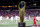 INDIANAPOLIS, INDIANA - JANUARY 10: The National Championship Trophy is seen on the field prior to the 2022 CFP National Championship Game between the Alabama Crimson Tide and Georgia Bulldogs at Lucas Oil Stadium on January 10, 2022 in Indianapolis, Indiana. (Photo by Kevin C. Cox/Getty Images)