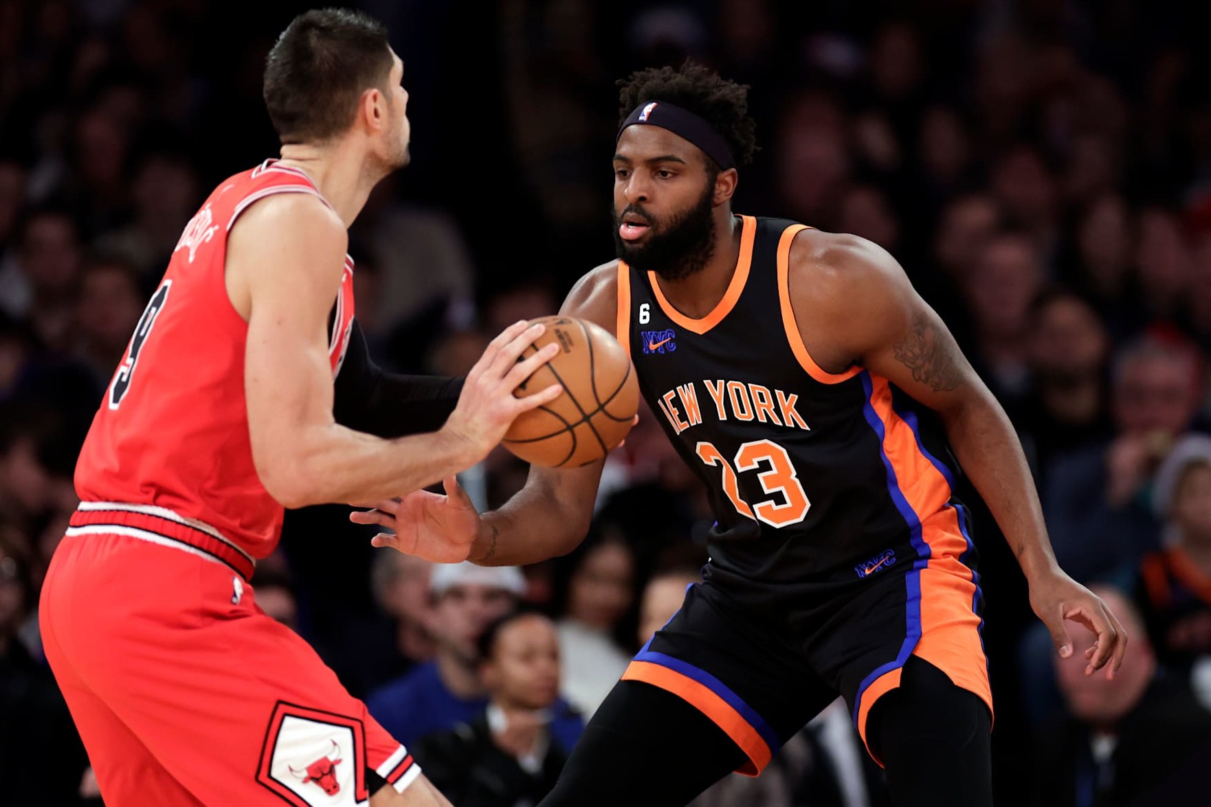NEW YORK, NEW YORK - DECEMBER 23: Mitchell Robinson #23 of the New York Knicks in action against the Chicago Bulls during the first half at Madison Square Garden on December 23, 2022 in New York City. NOTE TO USER: User expressly acknowledges and agrees that, by downloading and or using this Photograph, user is consenting to the terms and conditions of the Getty Images License Agreement. (Photo by Adam Hunger/Getty Images)