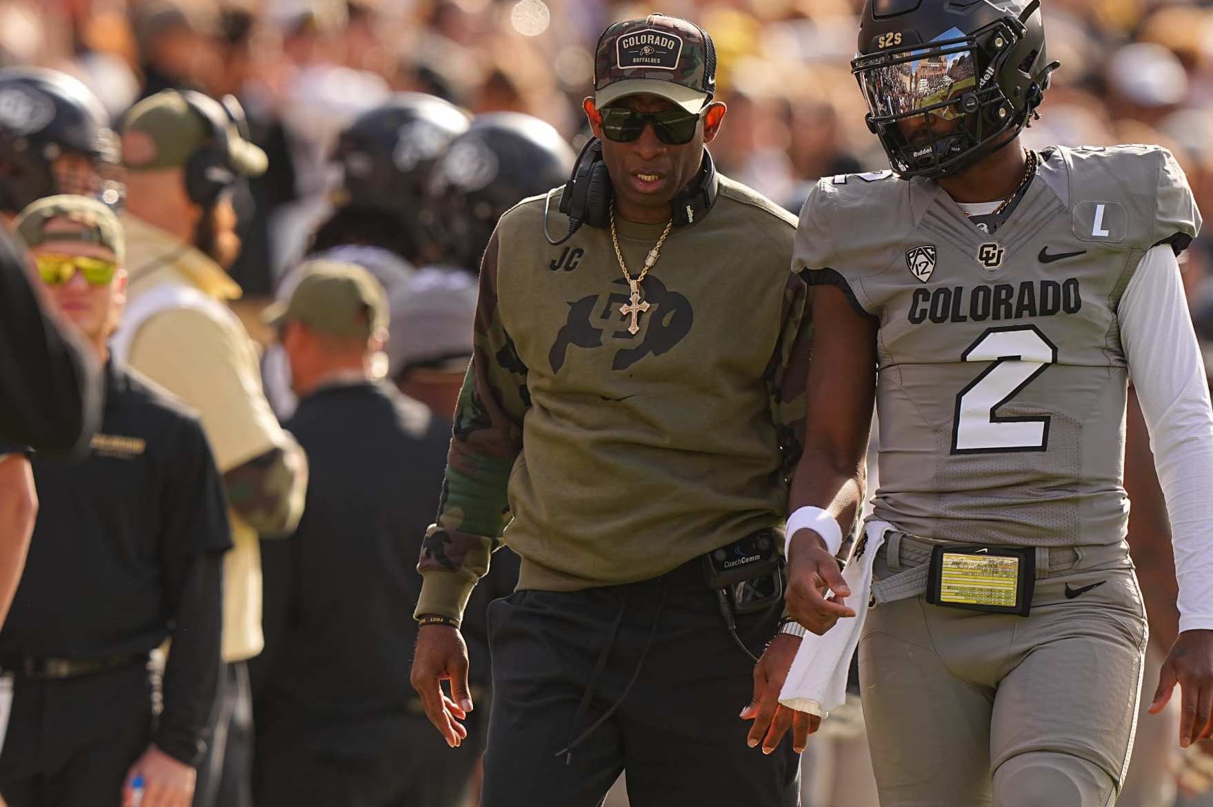 College Football: Colorado head coach Deion Sanders and Shedeur Sanders (2) talking vs Arizona at Folsom Field. 
Boulder, CO 11/11/2023 
CREDIT: Erick W. Rasco (Photo by Erick W. Rasco/Sports Illustrated via Getty Images) 
(Set Number: X164462)