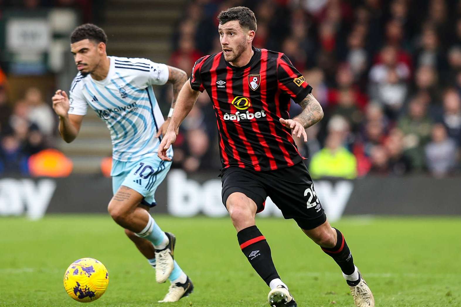 BOURNEMOUTH, ENGLAND - FEBRUARY 04: Morgan Gibbs-White of Nottingham Forest and Marcos Senesi of Bournemouth during the Premier League match between AFC Bournemouth and Nottingham Forest at Vitality Stadium on February 04, 2024 in Bournemouth, England. (Photo by Robin Jones - AFC Bournemouth/AFC Bournemouth via Getty Images)