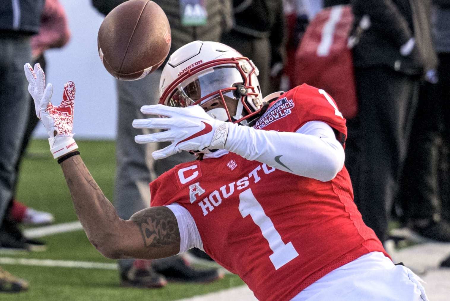 Houston wide receiver Nathaniel Dell (1) catches during the Independence Bowl NCAA football game in Shreveport, La. Friday, Dec. 23, 2022. (AP Photo/Matthew Hinton)
