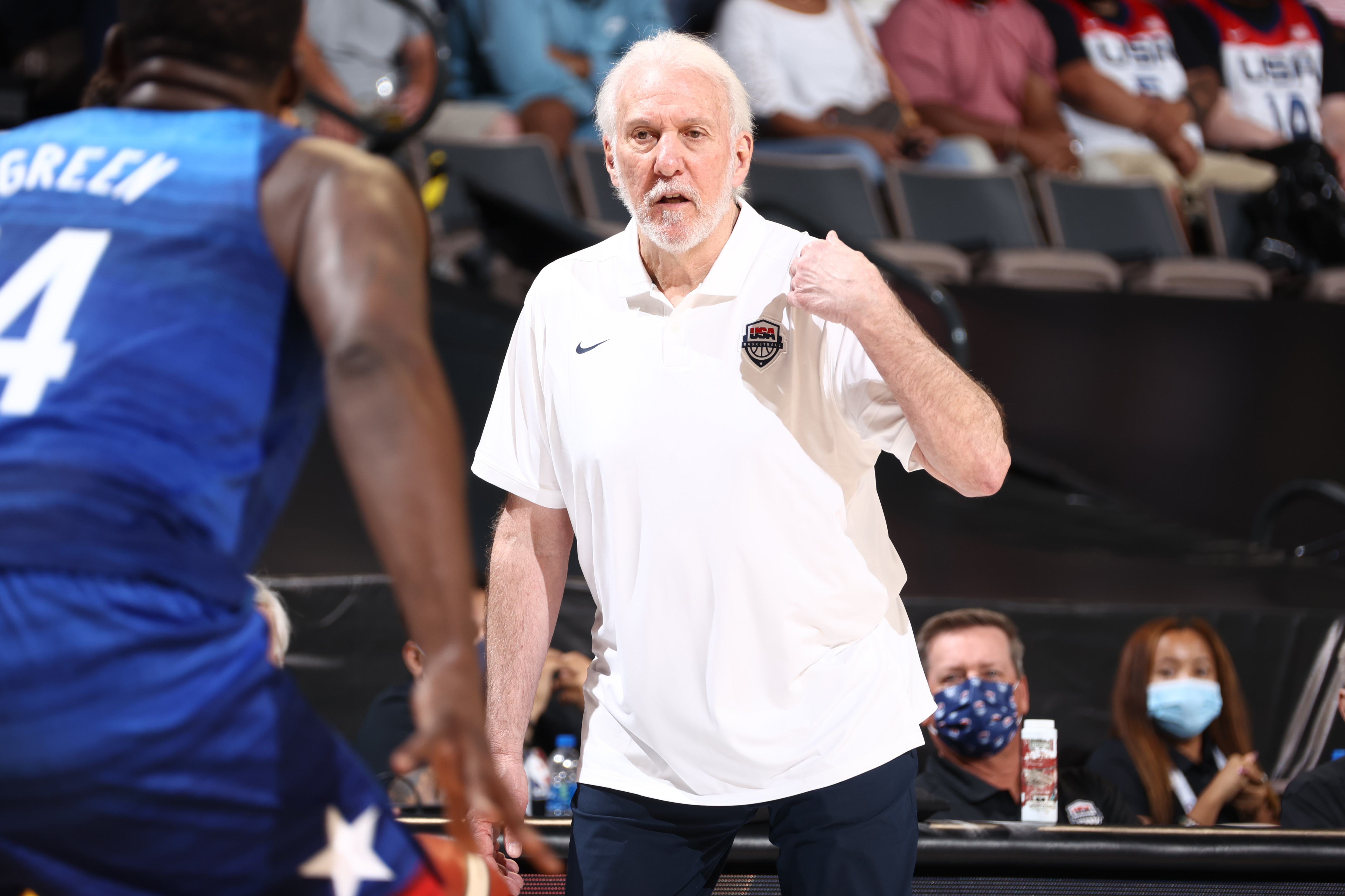 LAS VEGAS, NV - JULY 12: Head Coach Gregg Popovich of the USA Men's National Team talks with Draymond Green #14 during the game against the Australia Men's National Team on July 12, 2021 at Michelob ULTRA Arena in Las Vegas, Nevada. NOTE TO USER: User expressly acknowledges and agrees that, by downloading and or using this photograph, User is consenting to the terms and conditions of the Getty Images License Agreement. (Photo by Ned Dishman/NBAE via Getty Images)
