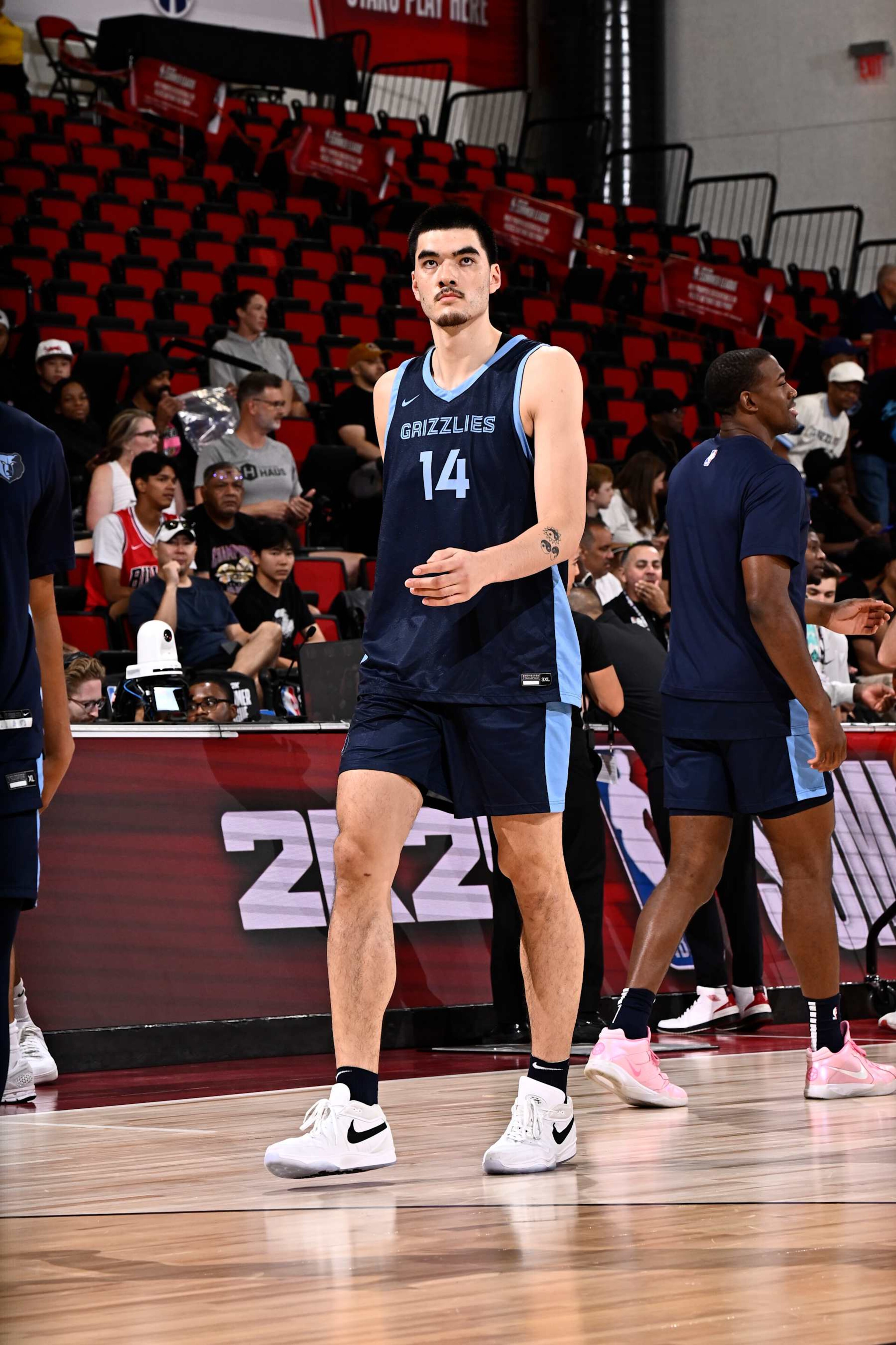 LAS VEGAS, NV - JULY 18: Zach Edey #14 of the Memphis Grizzlies warms up before the game against the New Orleans Pelicans on July 18, 2024 at the Cox Pavilion in Las Vegas, Nevada. NOTE TO USER: User expressly acknowledges and agrees that, by downloading and or using this photograph, User is consenting to the terms and conditions of the Getty Images License Agreement. Mandatory Copyright Notice: Copyright 2024 NBAE (Photo by David Dow/NBAE via Getty Images)