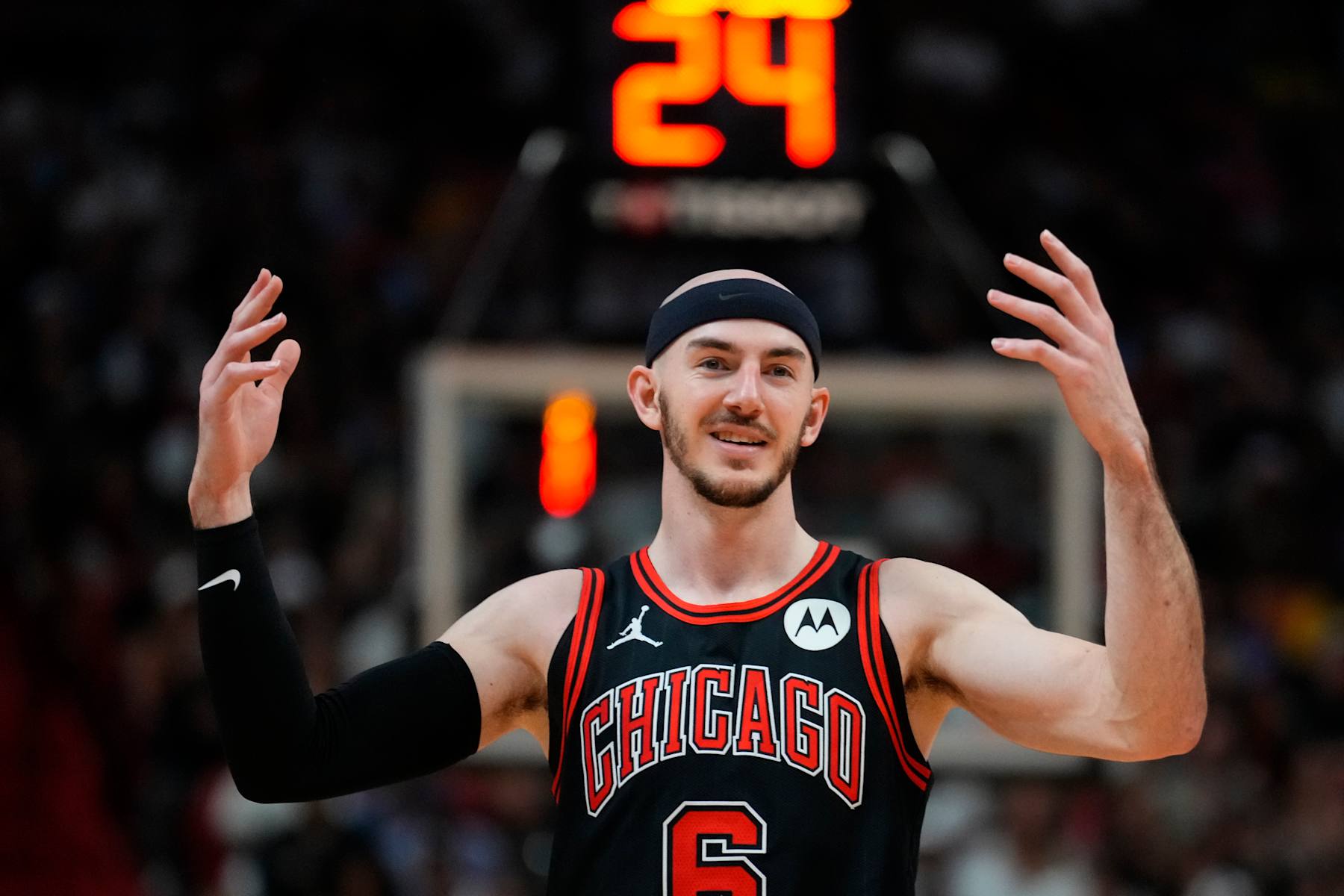 MIAMI, FLORIDA - APRIL 19: Alex Caruso #6 of the Chicago Bulls looks on against the Miami Heat in the fourth quarter during the Play-In Tournament at Kaseya Center on April 19, 2024 in Miami, Florida. NOTE TO USER: User expressly acknowledges and agrees that, by downloading and or using this photograph, User is consenting to the terms and conditions of the Getty Images License Agreement. (Photo by Rich Storry/Getty Images)