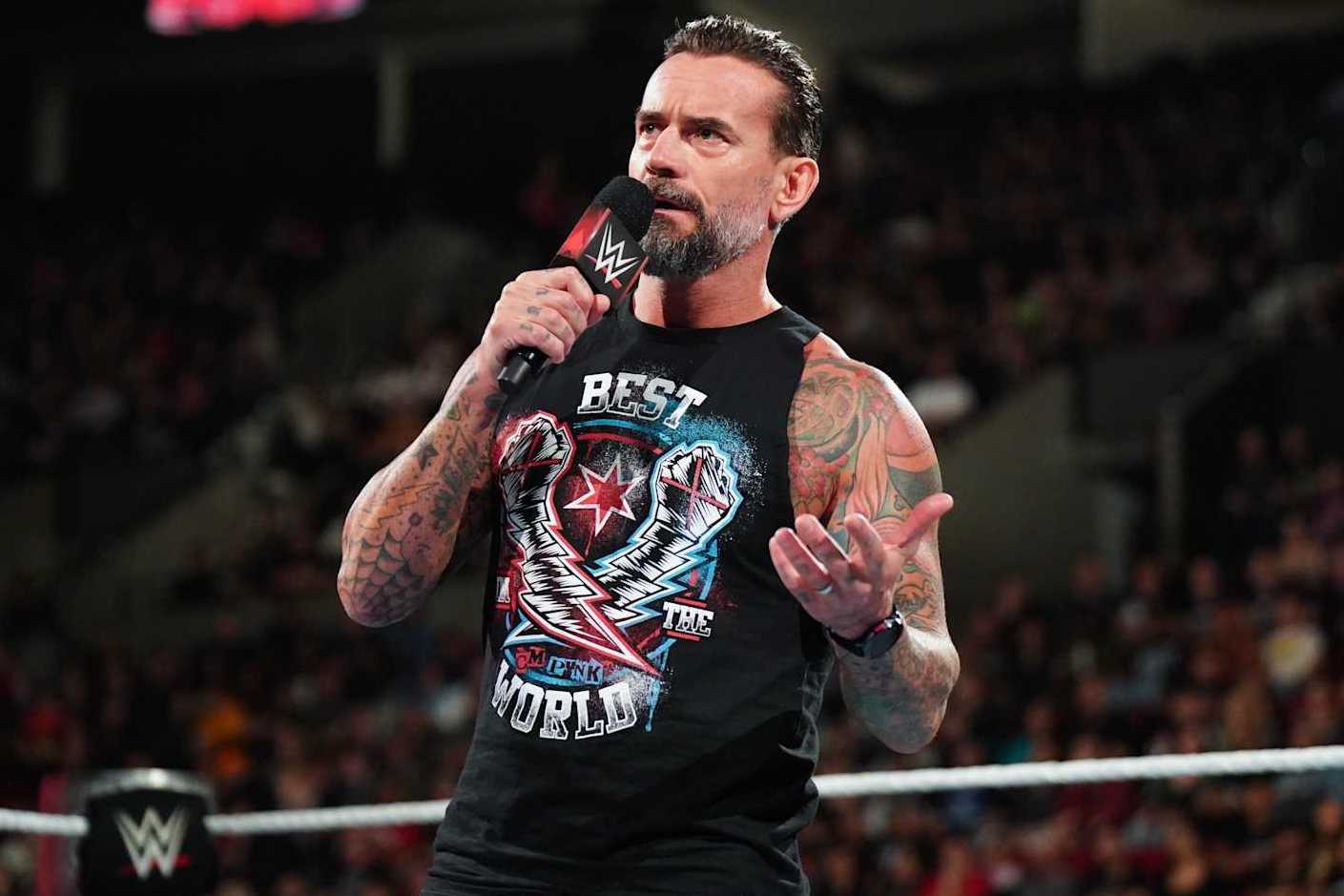 PORTLAND, OREGON - SEPTEMBER 16: CM Punk addresses the crowd during Monday Night RAW at Moda Center on September 16, 2024 in Portland, Oregon.  (Photo by WWE/Getty Images)