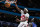 CHARLOTTE, NORTH CAROLINA - APRIL 02: Chris Boucher #25 of the Toronto Raptors dunks the ball against the Charlotte Hornets in the fourth quarter during their game at Spectrum Center on April 02, 2023 in Charlotte, North Carolina. NOTE TO USER: User expressly acknowledges and agrees that, by downloading and or using this photograph, User is consenting to the terms and conditions of the Getty Images License Agreement. (Photo by Jacob Kupferman/Getty Images)