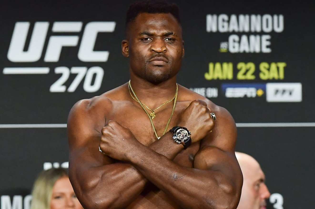 Reigning UFC Heavyweight Champion French Cameroonian mixed martial artist Francis Ngannou crosses his arms on his chest during weigh-in at the Anaheim Convention Center in Anaheim, California on January 21, 2022. (Photo by FREDERIC J. BROWN / AFP) (Photo by FREDERIC J. BROWN/AFP via Getty Images)