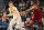 CLEVELAND, OHIO - DECEMBER 19: Lauri Markkanen #23 of the Utah Jazz brings the ball up the court around Evan Mobley #4 of the Cleveland Cavaliers during the third quarter at Rocket Mortgage Fieldhouse on December 19, 2022 in Cleveland, Ohio. The Cavaliers defeated the Jazz 114-91. NOTE TO USER: User expressly acknowledges and agrees that, by downloading and or using this photograph, User is consenting to the terms and conditions of the Getty Images License Agreement. (Photo by Jason Miller/Getty Images)