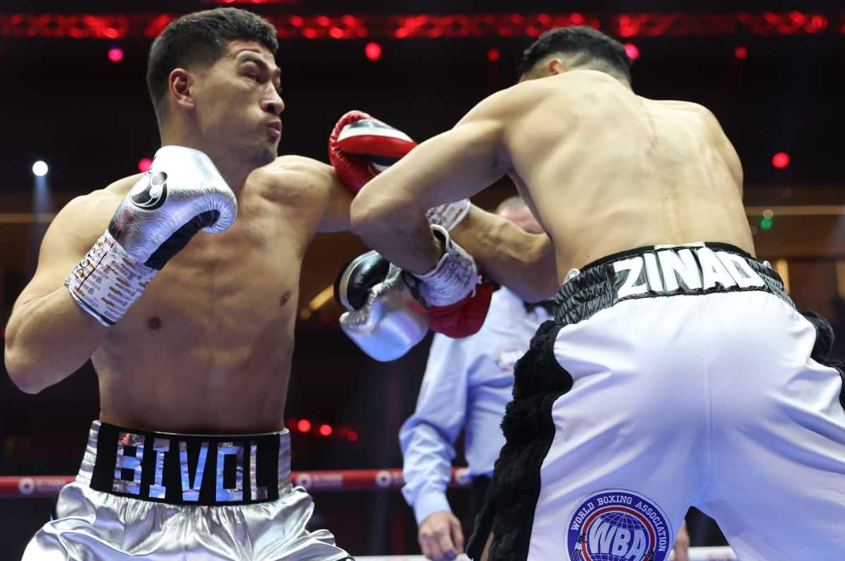 RIYADH, SAUDI ARABIA - JUNE 1: Dmitry Bivol (silver shorts) and Malik Zinad (white and black shorts) exchange punches during their WBA and IBO Light Heavyweight World Title contest on June 1, 2024 in Riyadh, Saudi Arabia. (Photo by Mark Robinson/Matchroom Boxing/Getty Images)