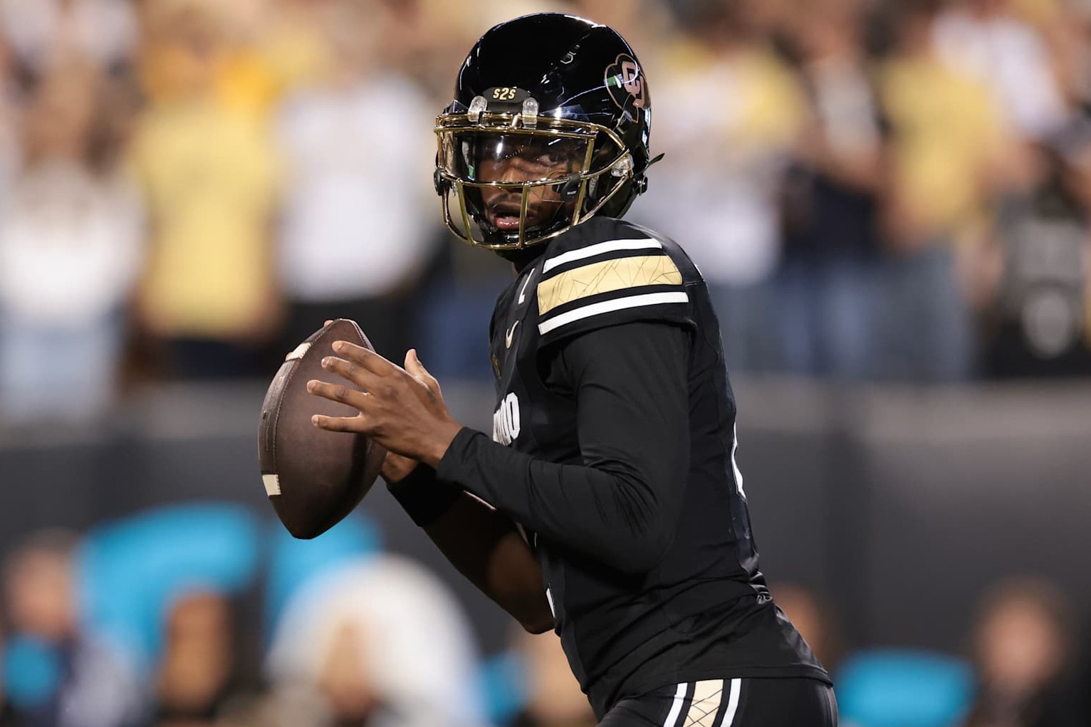 BOULDER, COLORADO - OCTOBER 12: Shedeur Sanders #2 of the Colorado Buffaloes looks to pass during the first half against the Kansas State Wildcats at Folsom Field on October 12, 2024 in Boulder, Colorado. (Photo by Andrew Wevers/Getty Images)