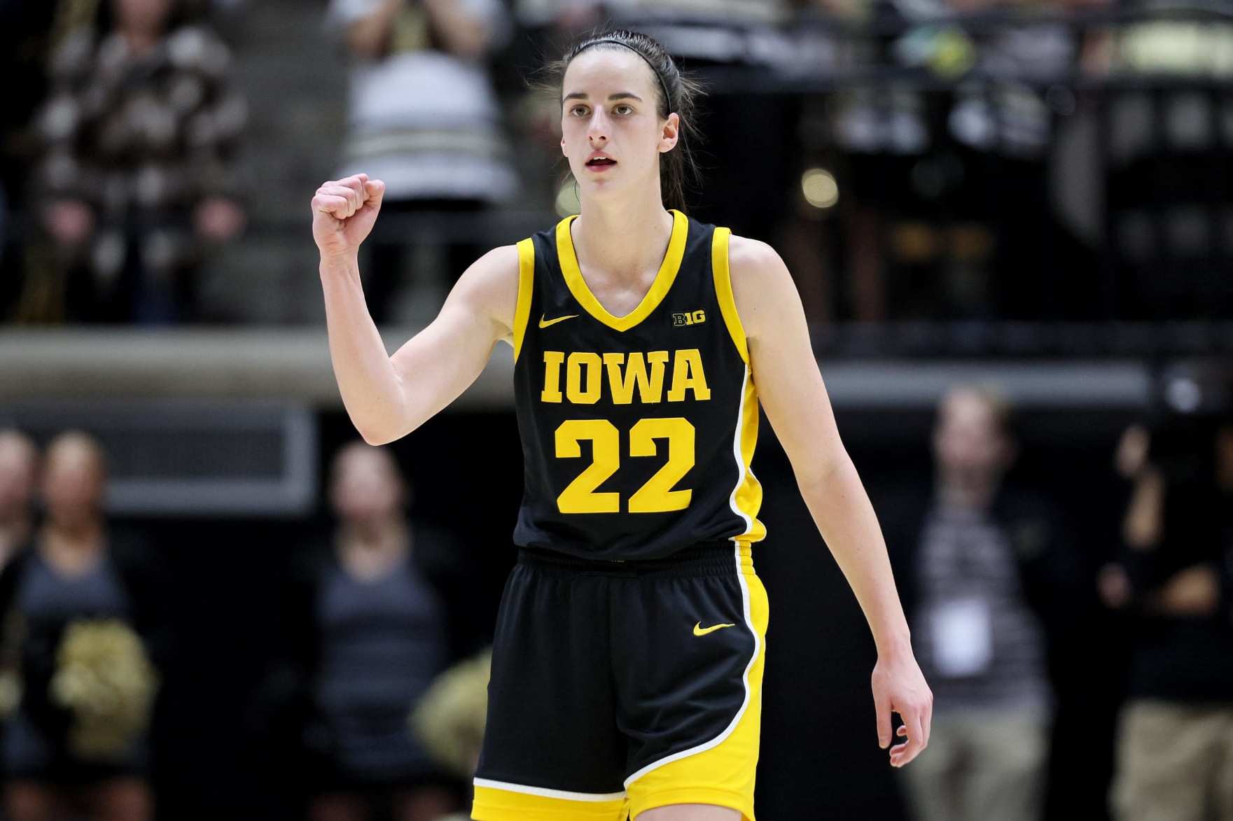 WEST LAFAYETTE, INDIANA - JANUARY 10: Caitlin Clark #22 of the Iowa Hawkeyes celebrates in the first half against the Purdue Boilermakers at Mackey Arena on January 10, 2024 in West Lafayette, Indiana. (Photo by Andy Lyons/Getty Images)