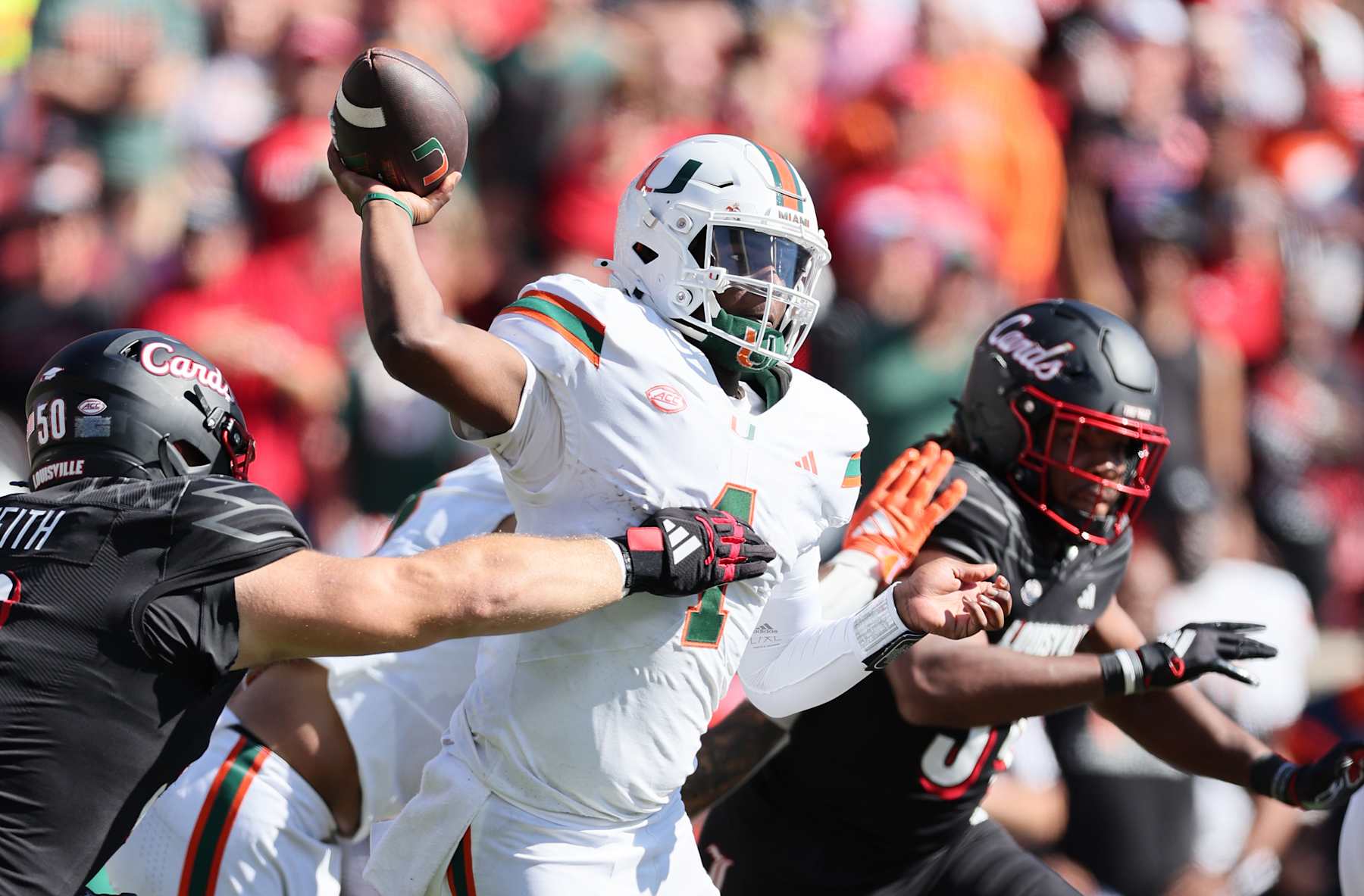 LOUISVILLE, KENTUCKY - OCTOBER 19: Cam Ward #1 of the Miami Hurricanes throws the ball against the Louisville Cardinals at Cardinal Stadium on October 19, 2024 in Louisville, Kentucky. (Photo by Andy Lyons/Getty Images)