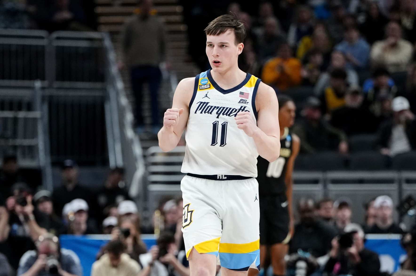 INDIANAPOLIS, INDIANA - MARCH 24: Tyler Kolek #11 of the Marquette Golden Eagles celebrates a basket against the Colorado Buffaloes during the first half in the second round of the NCAA Men's Basketball Tournament at Gainbridge Fieldhouse on March 24, 2024 in Indianapolis, Indiana. (Photo by Dylan Buell/Getty Images)