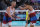 US' #02 Chase Budinger and US' #01 Miles Evans celebrate a point in the men's lucky loser beach volleyball match between Australia and USA during the Paris 2024 Olympic Games at the Eiffel Tower Stadium in Paris on August 3, 2024. (Photo by Thomas SAMSON / AFP) (Photo by THOMAS SAMSON/AFP via Getty Images)