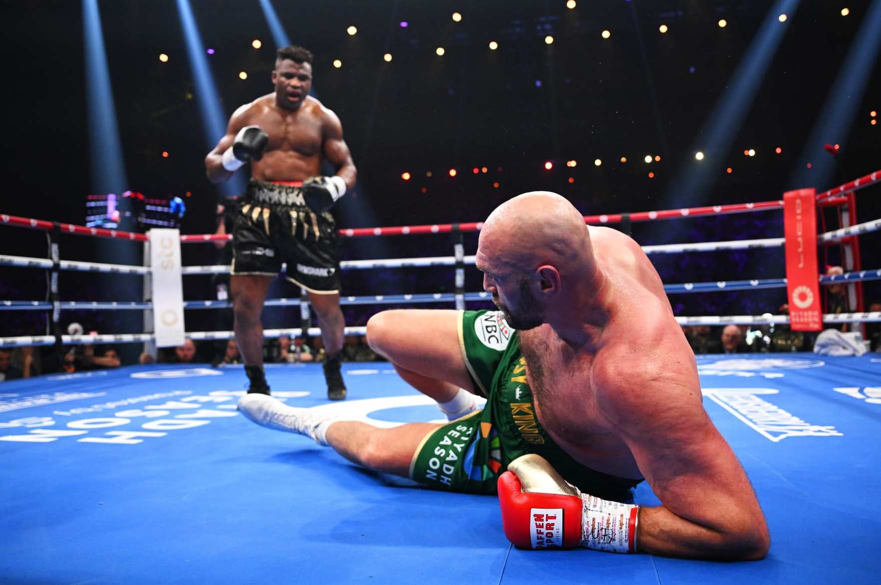 RIYADH, SAUDI ARABIA - OCTOBER 28: Francis Ngannou knocks down Tyson Fury during the Heavyweight fight between Tyson Fury and Francis Ngannou at Boulevard Hall on October 28, 2023 in Riyadh, Saudi Arabia. (Photo by Justin Setterfield/Getty Images)