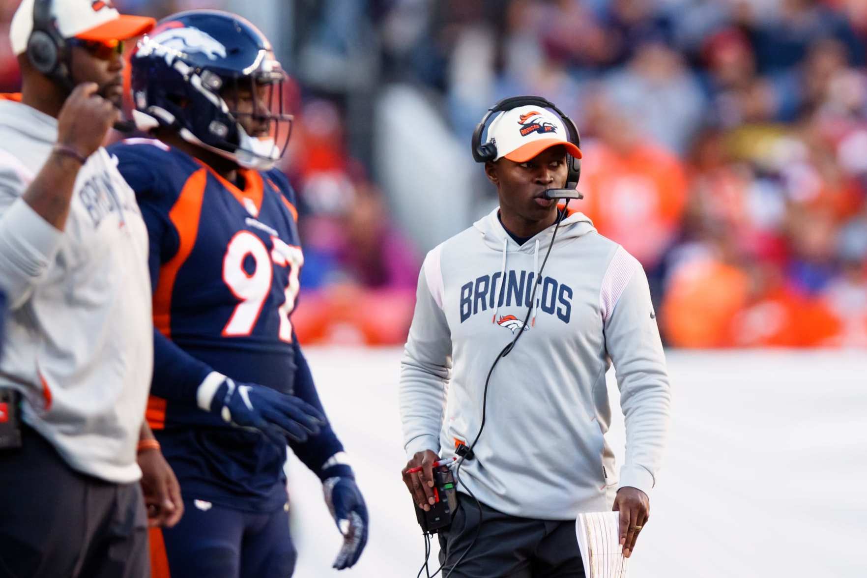DENVER, CO - DECEMBER 11: Defensive Coordinator Ejiro Evero of the Denver Broncos calls in a play against the Kansas City Chiefs in the first half at Empower Field at Mile High on December 11, 2022 in Denver, Colorado. (Photo by Justin Edmonds/Getty Images)