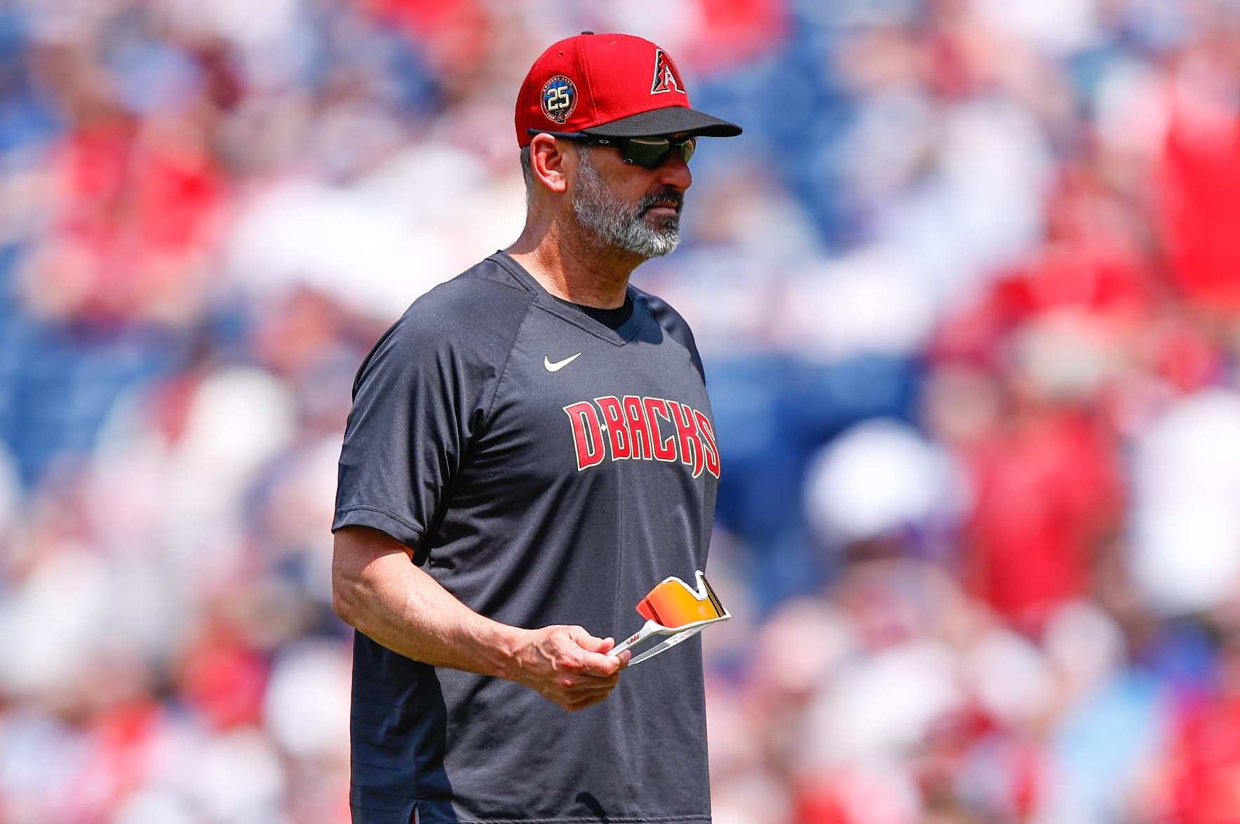 PHILADELPHIA, PA - MAY 24:  Torey Lovullo #17 of the Arizona Diamondbacks walks back to the dugout  during the game against the Philadelphia Phillies at Citizens Bank Park on May 24, 2023 in Philadelphia, Pennsylvania.  (Photo by Rich Graessle/Icon Sportswire via Getty Images)