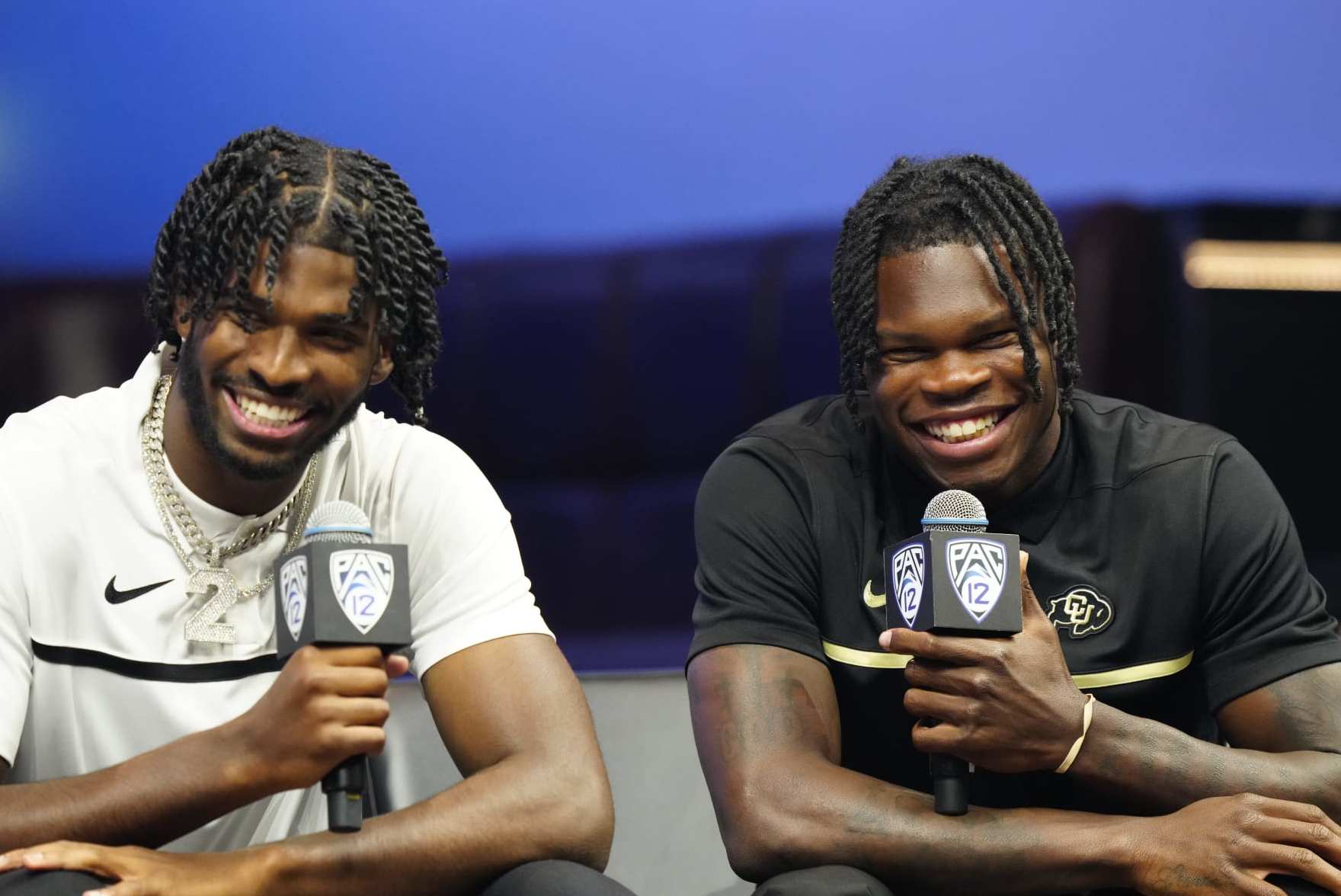 LAS VEGAS, NEVADA - JULY 21: (L-R) Shedeur Sanders #2 and Travis Hunter #12 of the University of Colorado Buffaloes speak with the media at Zouk Nightclub at Resorts World Las Vegas on July 21, 2023 in Las Vegas, Nevada. (Photo by Louis Grasse/Getty Images)