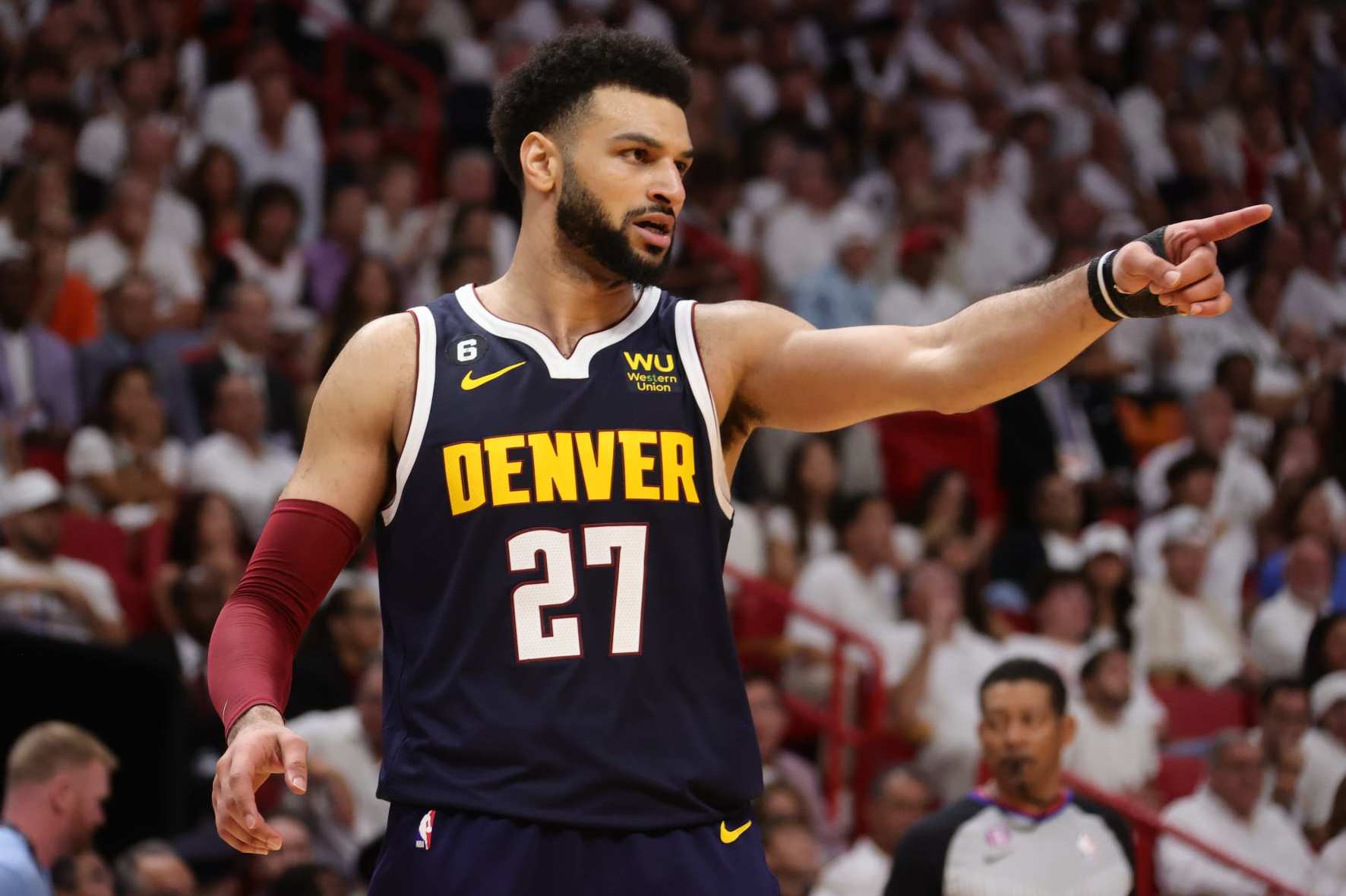 MIAMI, FL - JUNE 9: Jamal Murray #27 of the Denver Nuggets celebrates during Game Four of the 2023 NBA Finals against the Miami Heat on June 9, 2023 at Kaseya Center in Miami, Florida. NOTE TO USER: User expressly acknowledges and agrees that, by downloading and or using this Photograph, user is consenting to the terms and conditions of the Getty Images License Agreement. Mandatory Copyright Notice: Copyright 2023 NBAE (Photo by Nathaniel S. Butler/NBAE via Getty Images)