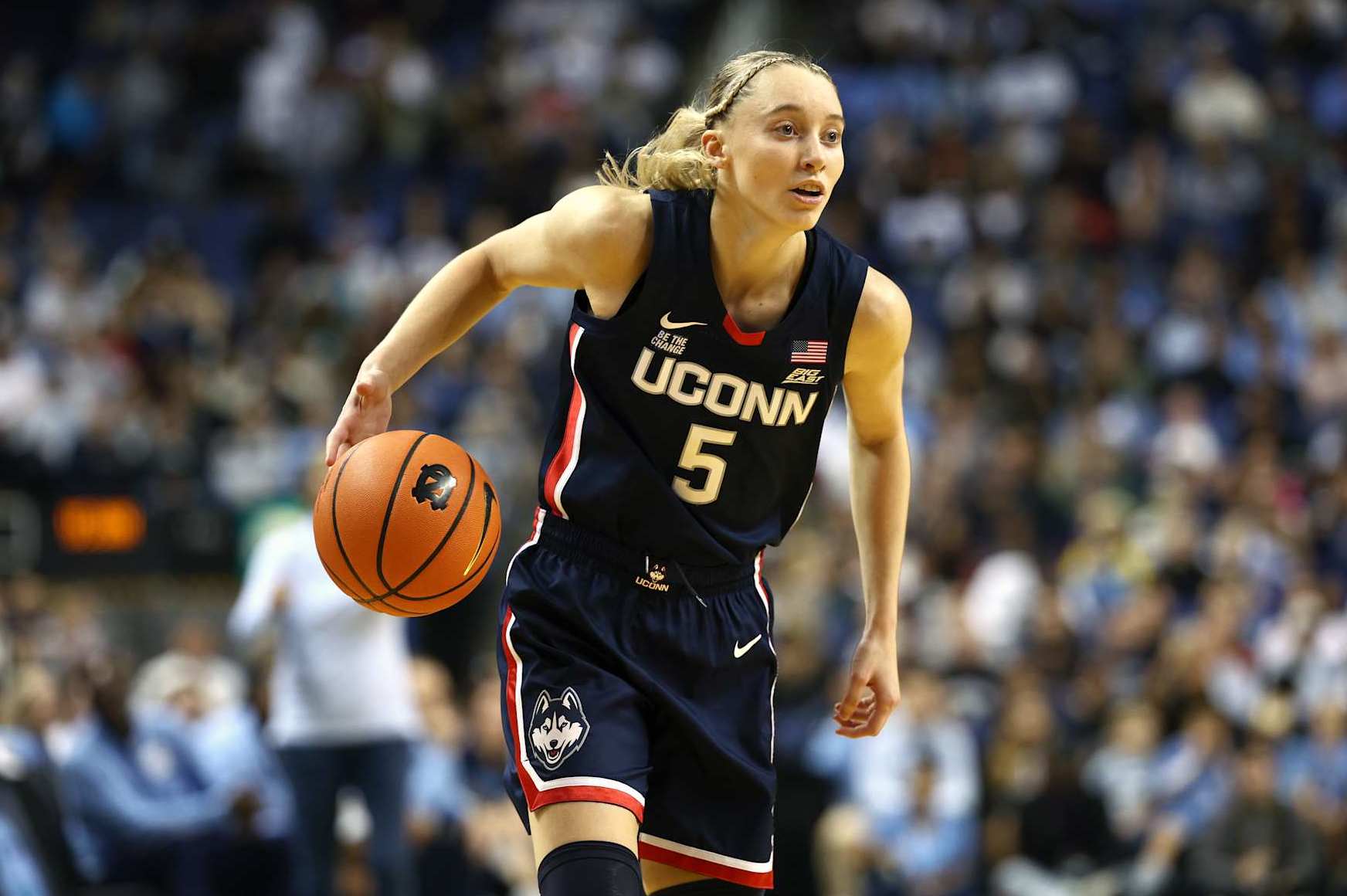 GREENSBORO, NORTH CAROLINA - NOVEMBER 15: Paige Bueckers #5 of the UConn Huskies dribbles during the second half of the game against the North Carolina Tar Heels at First Horizon Coliseum on November 15, 2024 in Greensboro, North Carolina. (Photo by Jared C. Tilton/Getty Images)