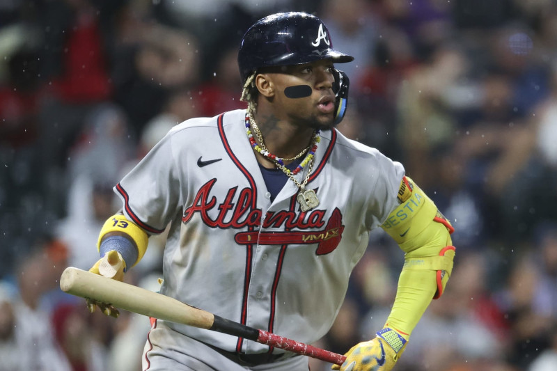 DENVER, COLORADO - AUGUST 28: Ronald Acuna Jr. #13 of the Atlanta Braves hits a two-run home run in the fifth inning against the Colorado Rockies at Coors Field on August 28, 2023 in Denver, Colorado. (Photo by Tyler Schank/Clarkson Creative/Getty Images)