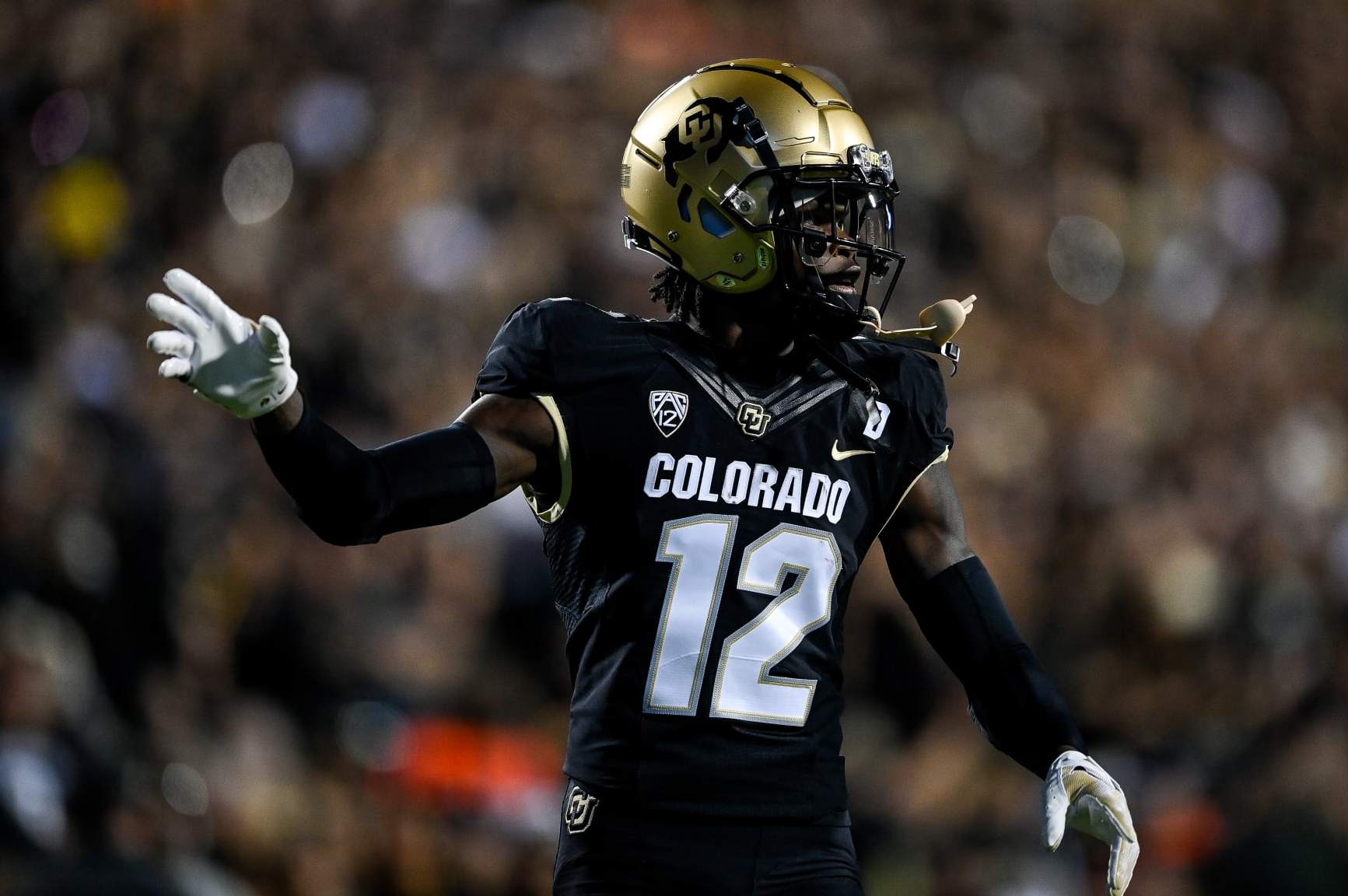 BOULDER, CO - SEPTEMBER 16:  Cornerback Travis Hunter #12 of the Colorado Buffaloes stands on the field before the start of a game against the Colorado Buffaloes at Folsom Field on September 16, 2023 in Boulder, Colorado. (Photo by Dustin Bradford/Getty Images)