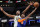 INDIANAPOLIS, INDIANA - OCTOBER 12: RJ Barrett #9 of the New York Knicks shoots the ball against while defended by Myles Turner #33 of the Indiana Pacers at Gainbridge Fieldhouse on October 12, 2022 in Indianapolis, Indiana.    NOTE TO USER: User expressly acknowledges and agrees that, by downloading and/or using this photograph, User is consenting to the terms and conditions of the Getty Images License Agreement. (Photo by Andy Lyons/Getty Images) (Photo by Andy Lyons/Getty Images)