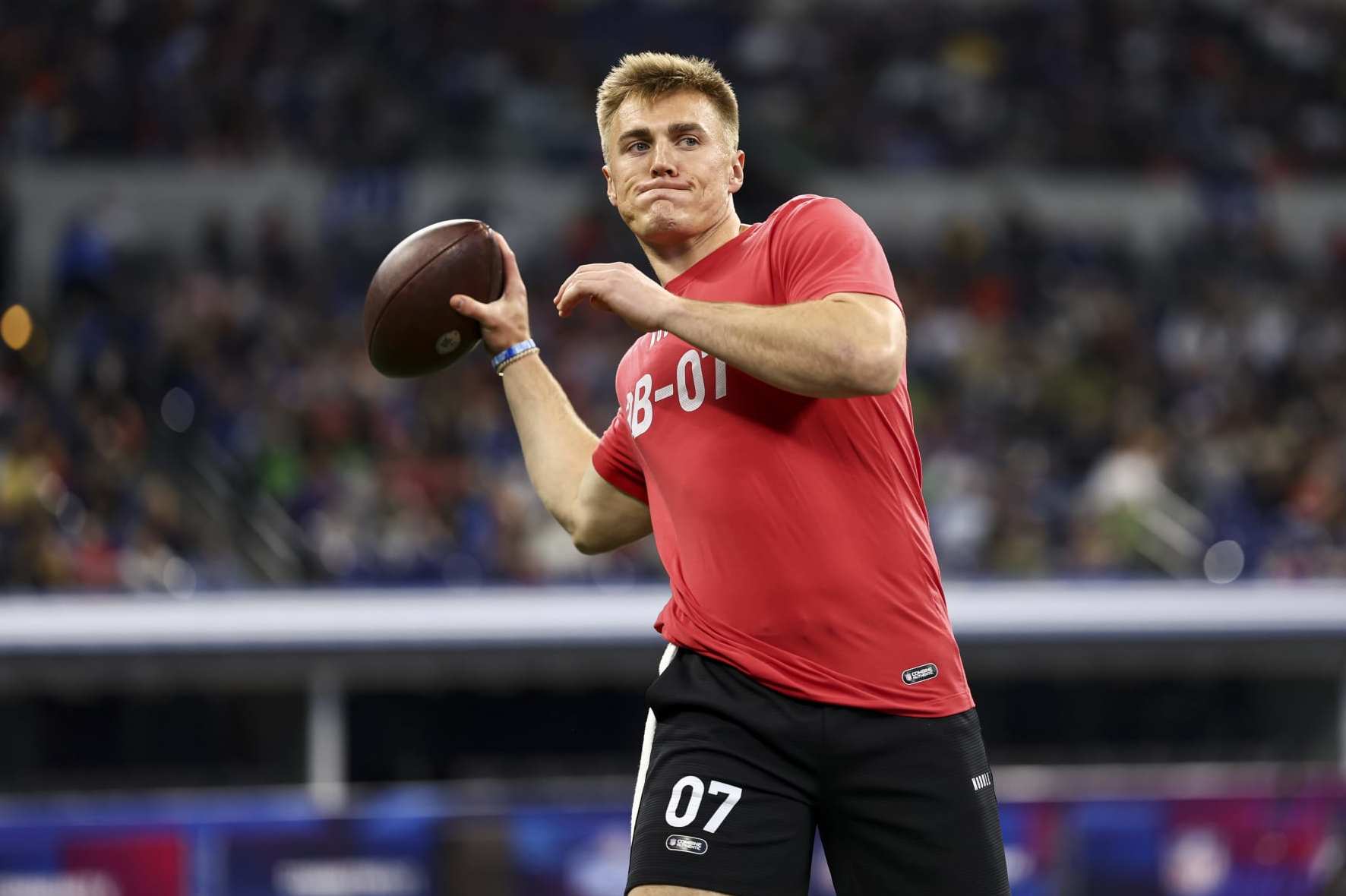 INDIANAPOLIS, INDIANA - MARCH 2: Bo Nix #QB07 of Oregon participates in a drill during the NFL Combine at the Lucas Oil Stadium on March 2, 2024 in Indianapolis, Indiana. (Photo by Kevin Sabitus/Getty Images)
