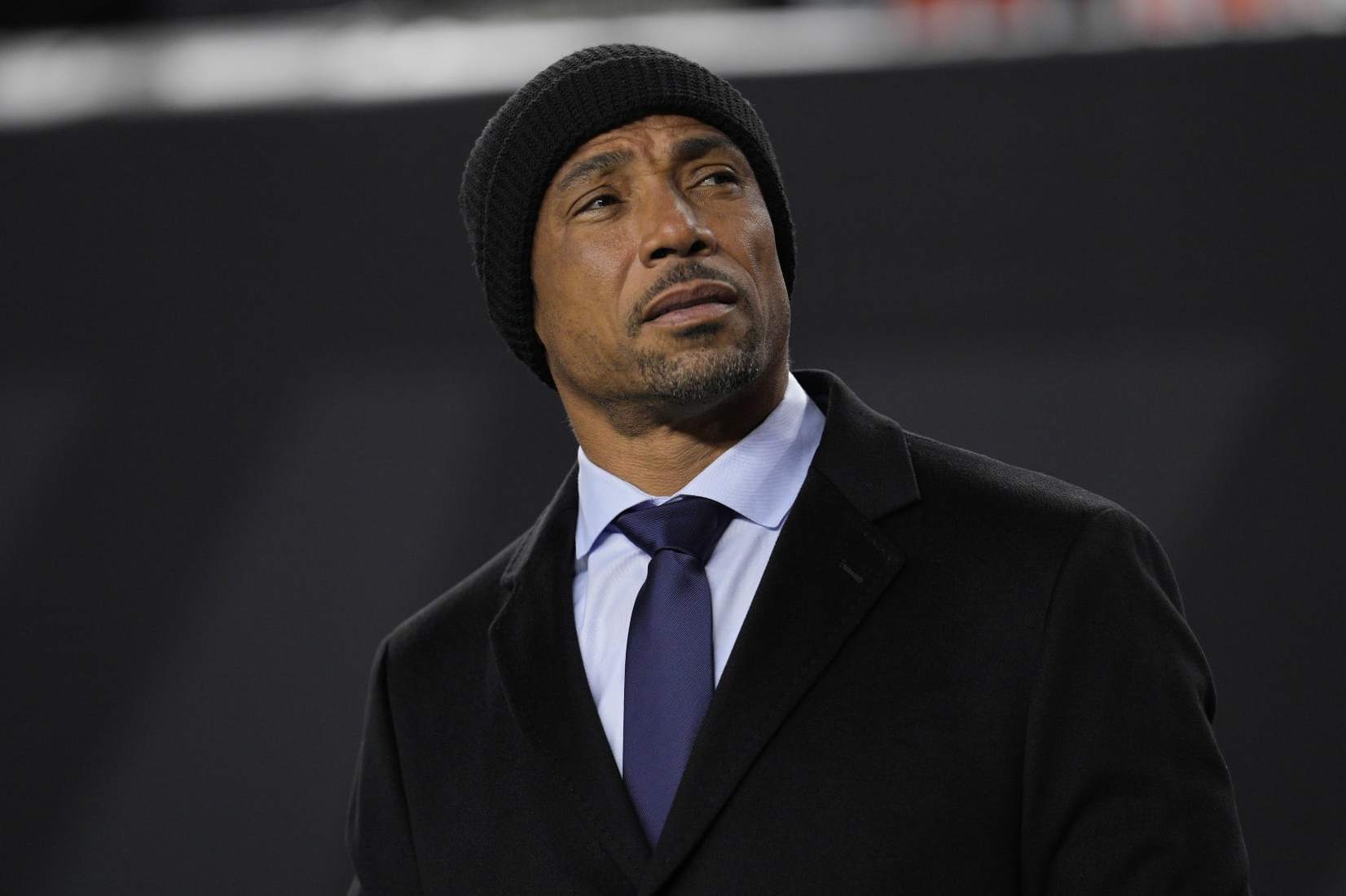 CINCINNATI, OHIO - NOVEMBER 05: Commentator Rodney Harrison stands on the sidelines during a NFL football game between the Buffalo Bills and Cincinnati Bengals at Paycor Stadium on November 05, 2023 in Cincinnati, Ohio. (Photo by Jeff Dean/Getty Images)