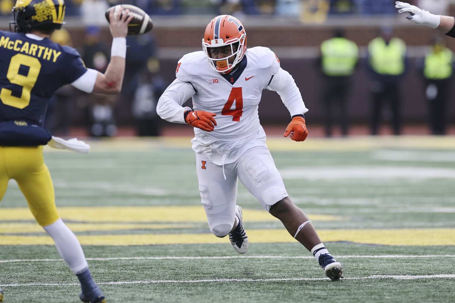 ANN ARBOR, MI - NOVEMBER 19: Illinois Fighting Illini defensive lineman Jer'Zhan Newton (4) rushes against Michigan Wolverines quarterback J.J. McCarthy (9) during a college football game on November 19, 2022 at Michigan Stadium in Ann Arbor, Michigan. (Photo by Joe Robbins/Icon Sportswire via Getty Images)