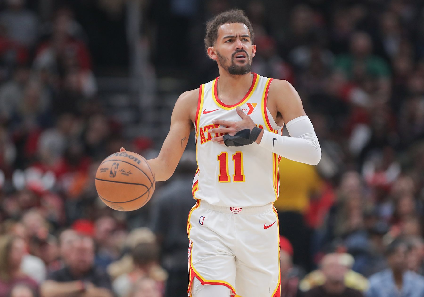 CHICAGO, IL - APRIL 17: Trae Young #11 of the Atlanta Hawks brings the ball up court during first half of the 2024 Play-In Tournament against the Chicago Bulls at the United Center on April 17, 2024  in Chicago, Illinois. (Photo by Melissa Tamez/Icon Sportswire via Getty Images)