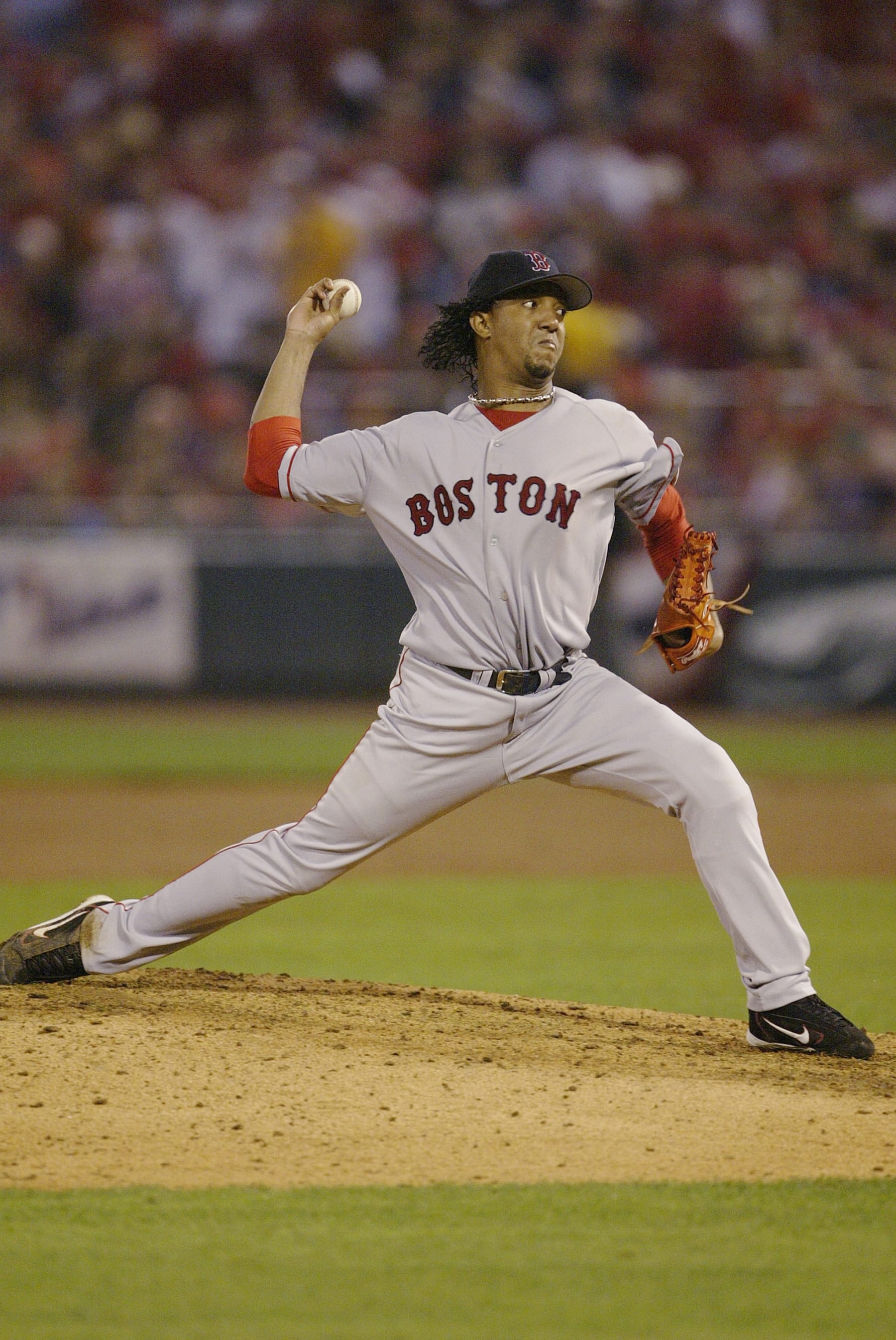 ST. LOUIS - OCTOBER 26:  Pitcher Pedro Martinez of the Boston Red Sox pitches during game three of the 2004 World Series against the St. Louis Cardinals at Busch Stadium on October 26, 2004 in St. Louis, Missouri. The Red Sox defeated the Cardinals 4-1. (Photo by Ron Vesely/MLB Photos via Getty Images)