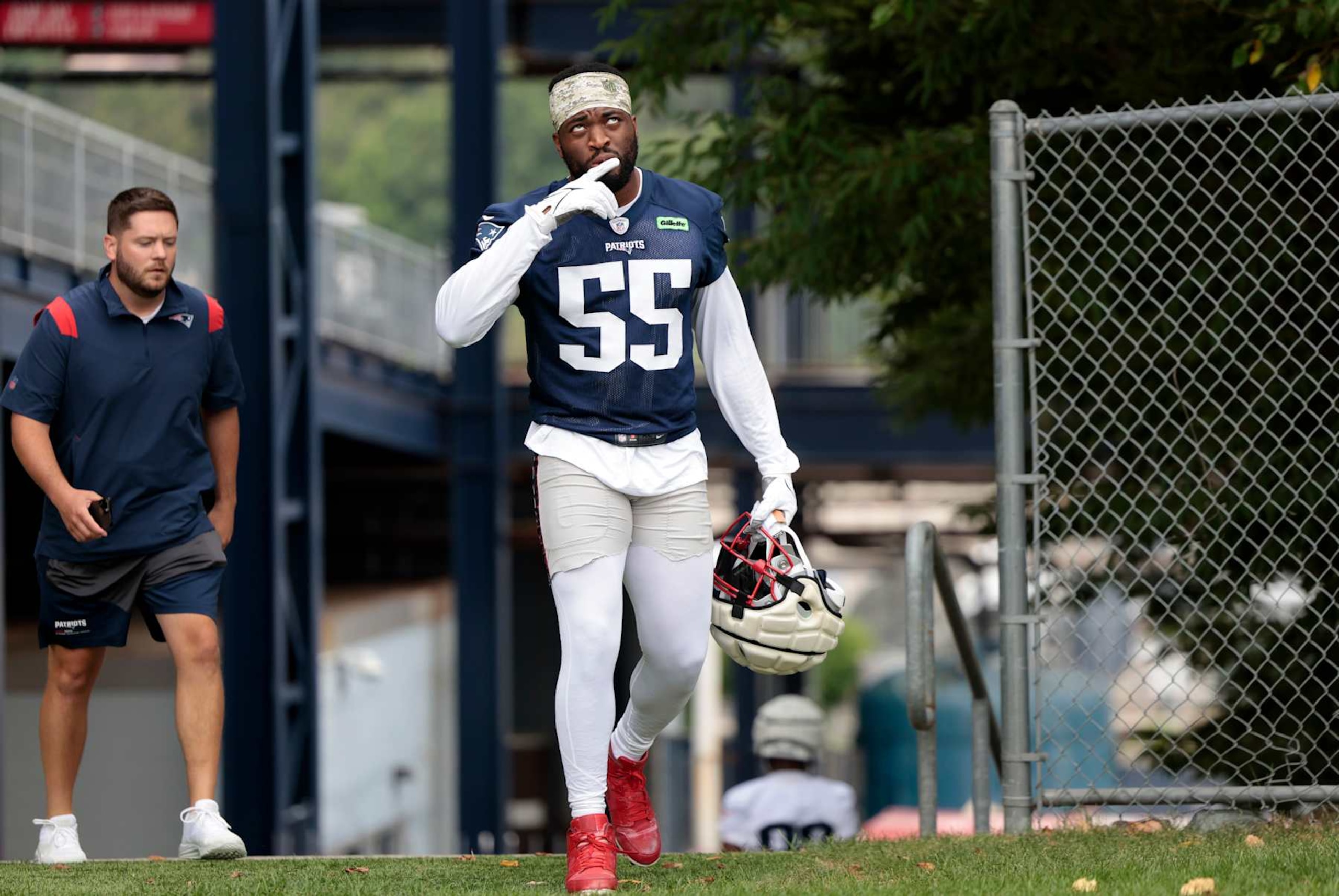 FOXBOROUGH, MA - JULY 25: New England Patriots linebacker Josh Uche (55) says a prayer as he arrives during New England Patriots Training Camp on July 25, 2024, at Gillette Stadium in Foxborough, Massachusetts. (Photo by Fred Kfoury III/Icon Sportswire via Getty Images)