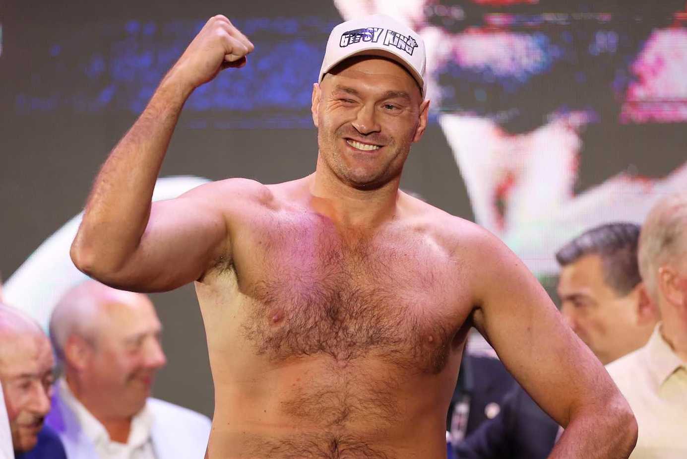 RIYADH, SAUDI ARABIA - MAY 17: Tyson Fury poses after weighing in ahead of the IBF, WBA, WBC and WBO heavyweight titles' fight between Tyson Fury and Oleksandr Usyk during the Ring Of Fire Official weigh-in at BLVD City - Music World on May 17, 2024 in Riyadh, Saudi Arabia. (Photo by Richard Pelham/Getty Images)