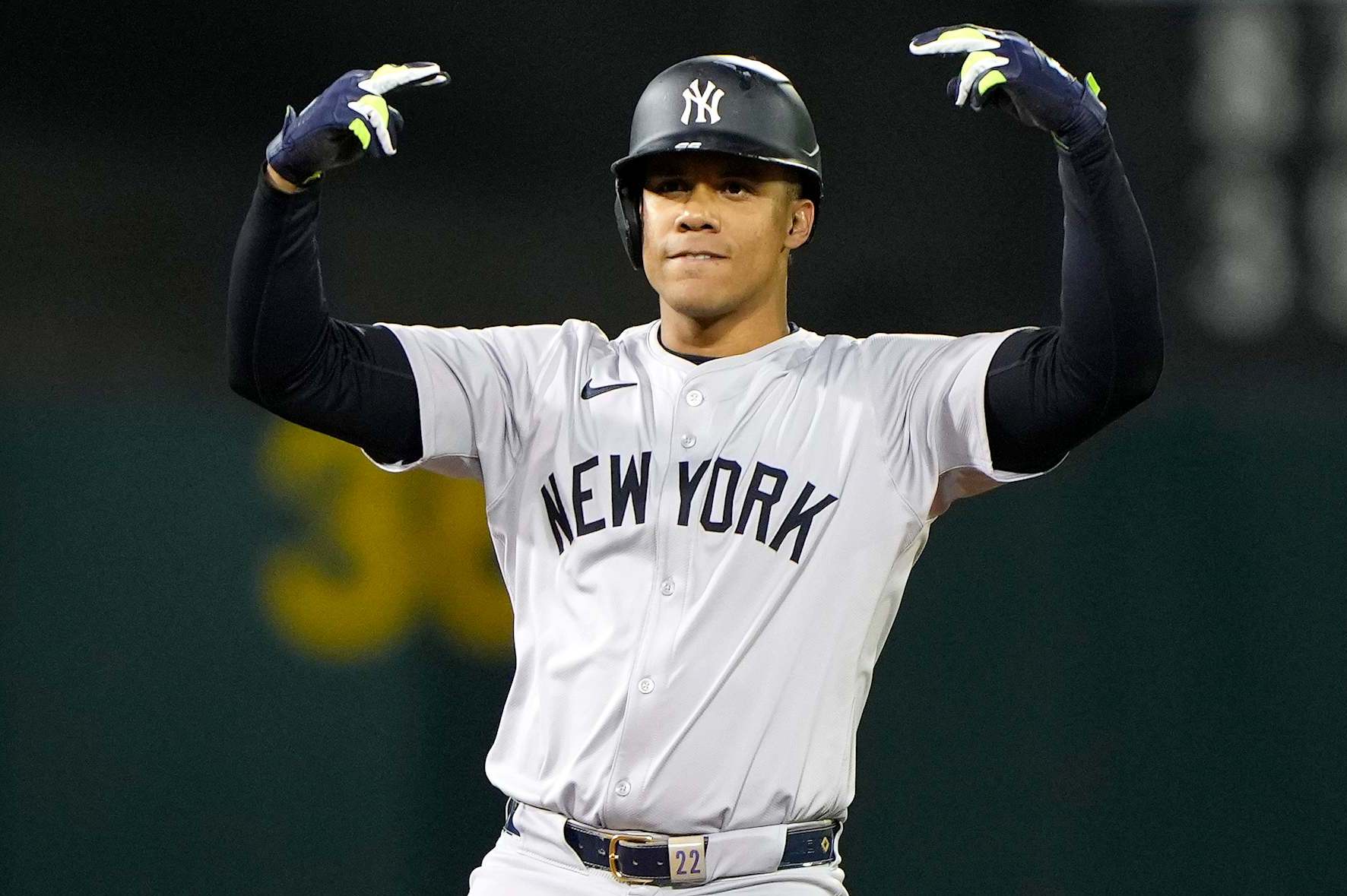 OAKLAND, CALIFORNIA - SEPTEMBER 20: Juan Soto #22 of the New York Yankees standing on second base celebrating after he hit a pinch-hit rbi double scoring Oswaldo Cabrera #95 against the Oakland Athletics in the top of the 10th inning at the Oakland Coliseum on September 20, 2024 in Oakland, California. (Photo by Thearon W. Henderson/Getty Images)