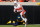 STILLWATER, OK - SEPTEMBER 26:  Running back Chuba Hubbard #30 of the Oklahoma State Cowboys pciks up 16-yards before getting tripped up by cornerback Alonzo Addae #4 of the West Virginia Mountaineers on a third down in the third quarter on September 26, 2020 at Boone Pickens Stadium in Stillwater, Oklahoma.  Hubbard had 101 yards rushing as OSU won 27-13. (Photo by Brian Bahr/Getty Images)