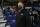 Gonzaga athletic director Chris Standiford looks on before the team's college basketball exhibition game against Lewis-Clark State, Friday, Nov. 5, 2021, in Spokane, Wash. (AP Photo/Young Kwak)