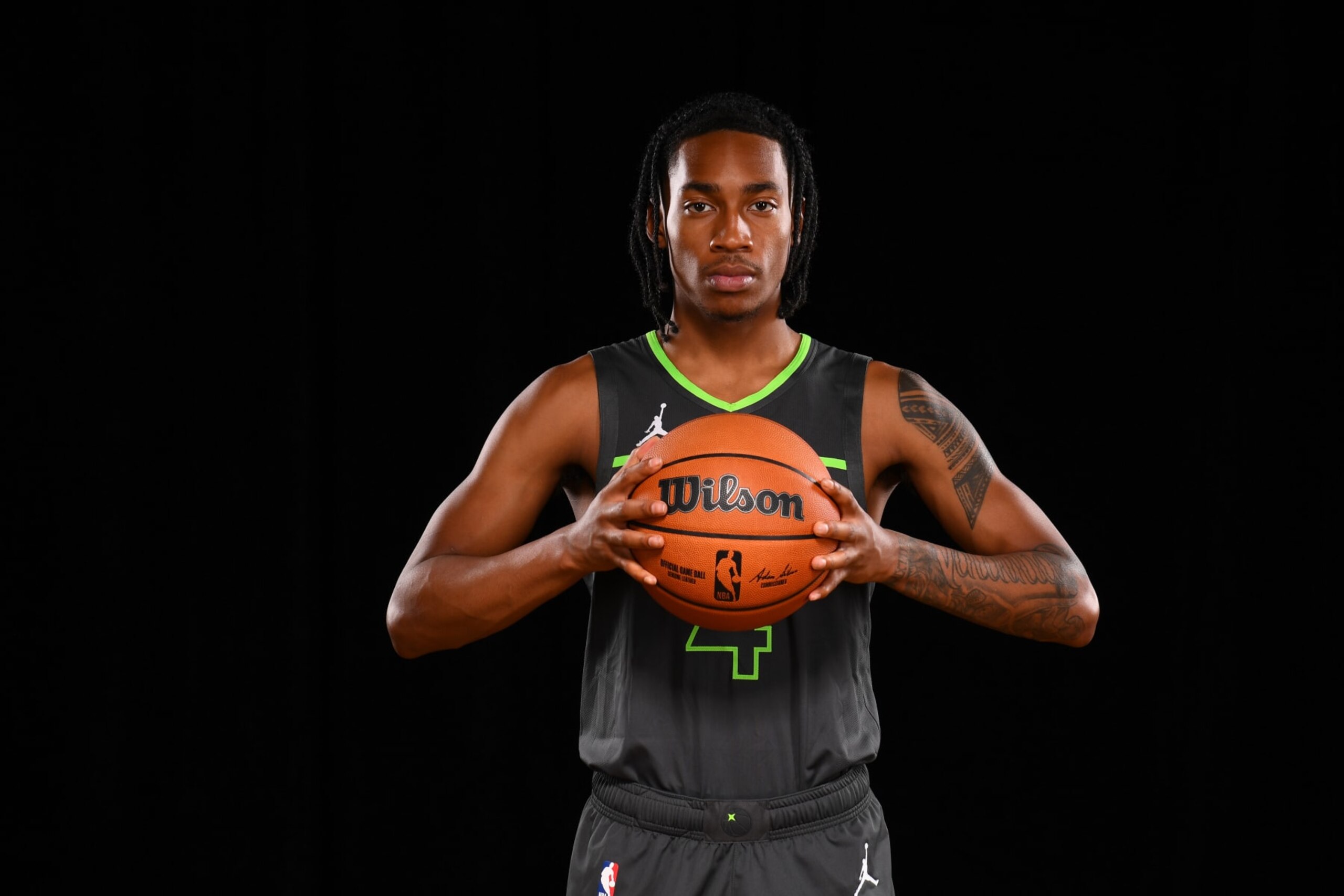 LAS VEGAS, NV - JULY 17:  Rob Dillingham #4 of the Minnesota Timberwolves poses for a portrait during the 2024 NBA Rookie Photo Shoot on July 17, 2024 at the University of Nevada, Las Vegas campus in Las Vegas, Nevada. NOTE TO USER: User expressly acknowledges and agrees that, by downloading and/or using this Photograph, user is consenting to the terms and conditions of the Getty Images License Agreement. Mandatory Copyright Notice: Copyright 2024 NBAE (Photo by Brian Babineau/NBAE via Getty Images)