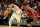 MIAMI, FLORIDA - OCTOBER 21: Jayson Tatum #0 of the Boston Celtics drives against Jimmy Butler #22 of the Miami Heat during the first quarter of the game at FTX Arena on October 21, 2022 in Miami, Florida. NOTE TO USER: User expressly acknowledges and agrees that, by downloading and or using this photograph, User is consenting to the terms and conditions of the Getty Images License Agreement. (Photo by Megan Briggs/Getty Images)
