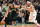 BOSTON, MASSACHUSETTS - MARCH 05: Jayson Tatum #0 of the Boston Celtics drives to the basket against Trevor Keels #3 of the New York Knicks during overtime at the TD Garden on March 05, 2023 in Boston, Massachusetts. NOTE TO USER: User expressly acknowledges and agrees that, by downloading and or using this photograph, User is consenting to the terms and conditions of the Getty Images License Agreement. (Photo by Brian Fluharty/Getty Images)