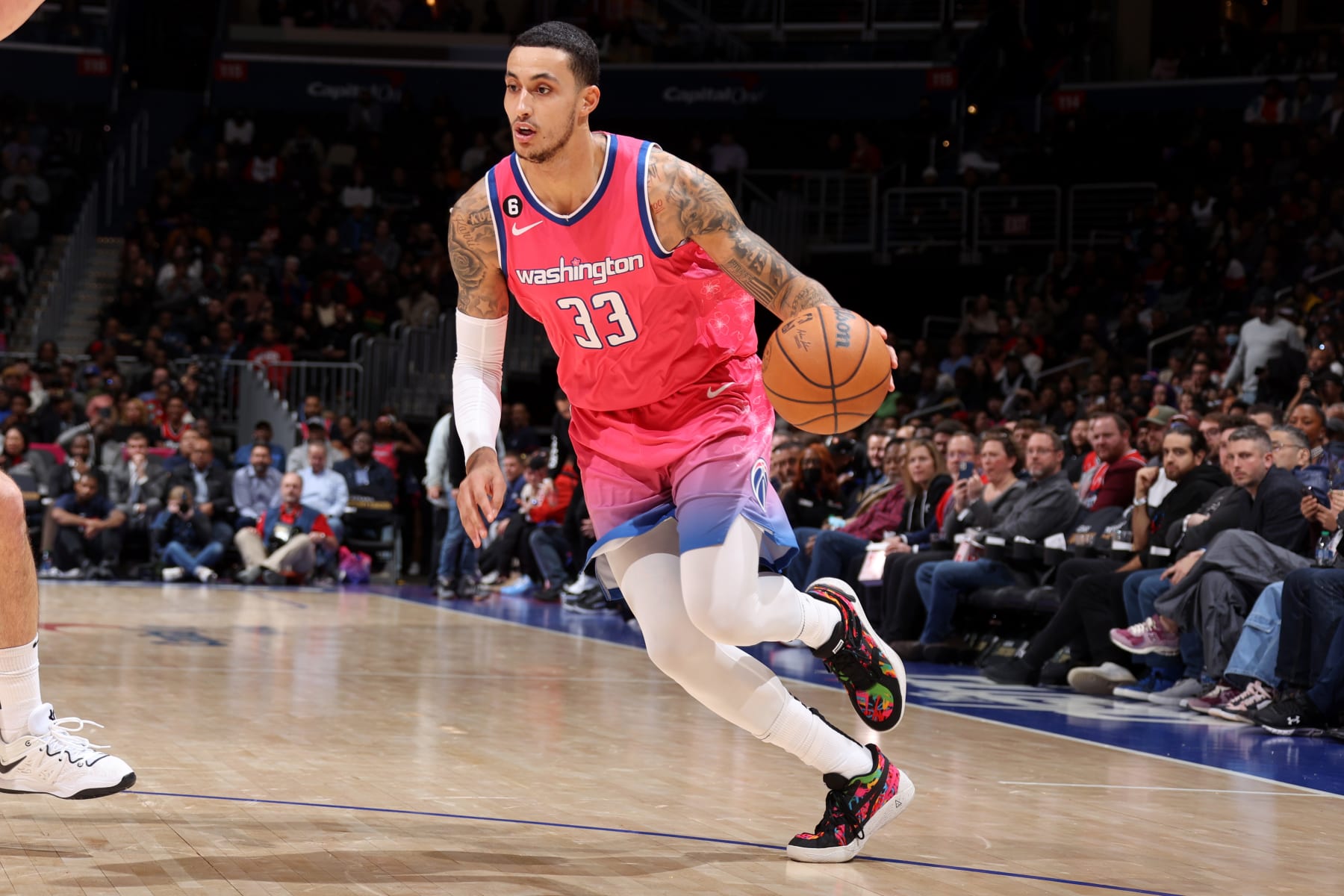 WASHINGTON, DC - DECEMBER 12: Kyle Kuzma #33 of the Washington Wizards dribbles the ball during the game against the Brooklyn Nets on December 12, 2022 at Capital One Arena in Washington, DC. NOTE TO USER: User expressly acknowledges and agrees that, by downloading and or using this Photograph, user is consenting to the terms and conditions of the Getty Images License Agreement. Mandatory Copyright Notice: Copyright 2022 NBAE (Photo by Stephen Gosling/NBAE via Getty Images)