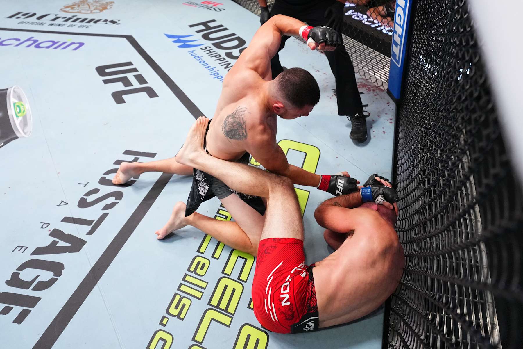 LAS VEGAS, NEVADA - SEPTEMBER 07: (L-R) Steve Garcia punches Kyle Nelson of Canada in a featherweight fight during the UFC Fight Night event at UFC APEX on September 07, 2024 in Las Vegas, Nevada. (Photo by Chris Unger/Zuffa LLC via Getty Images)
