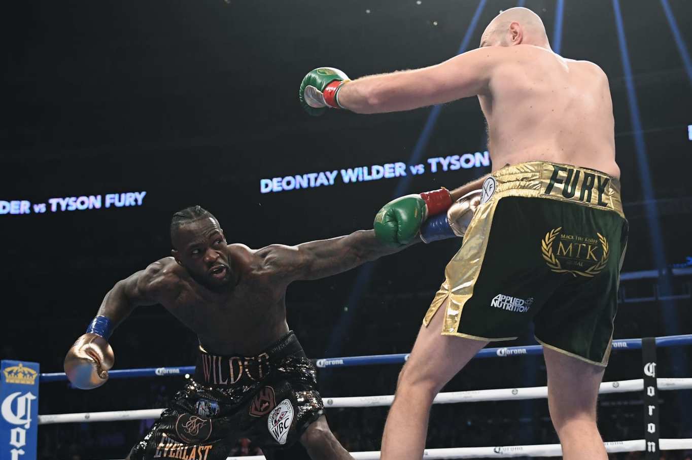 LOS ANGELES, CA - DECEMBER 01: Deontay Wilder jabs Tyson Fury in the first round, fighting to a draw during the WBC Heavyweight Championship at Staples Center on December 1, 2018 in Los Angeles, California. (Photo by Harry How/Getty Images)